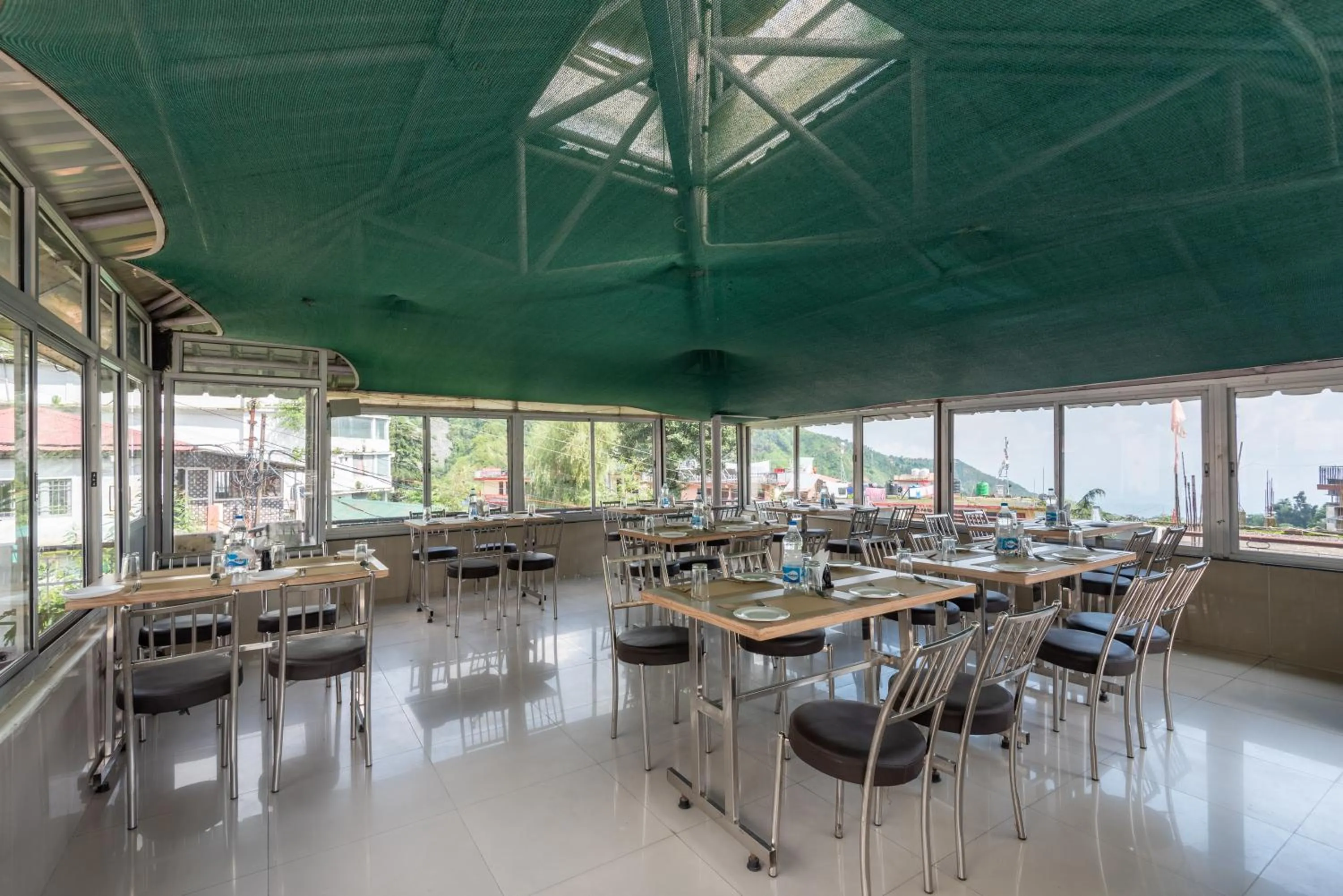 Restaurant/Places to Eat in Meghavan Resort By DLS Hotels