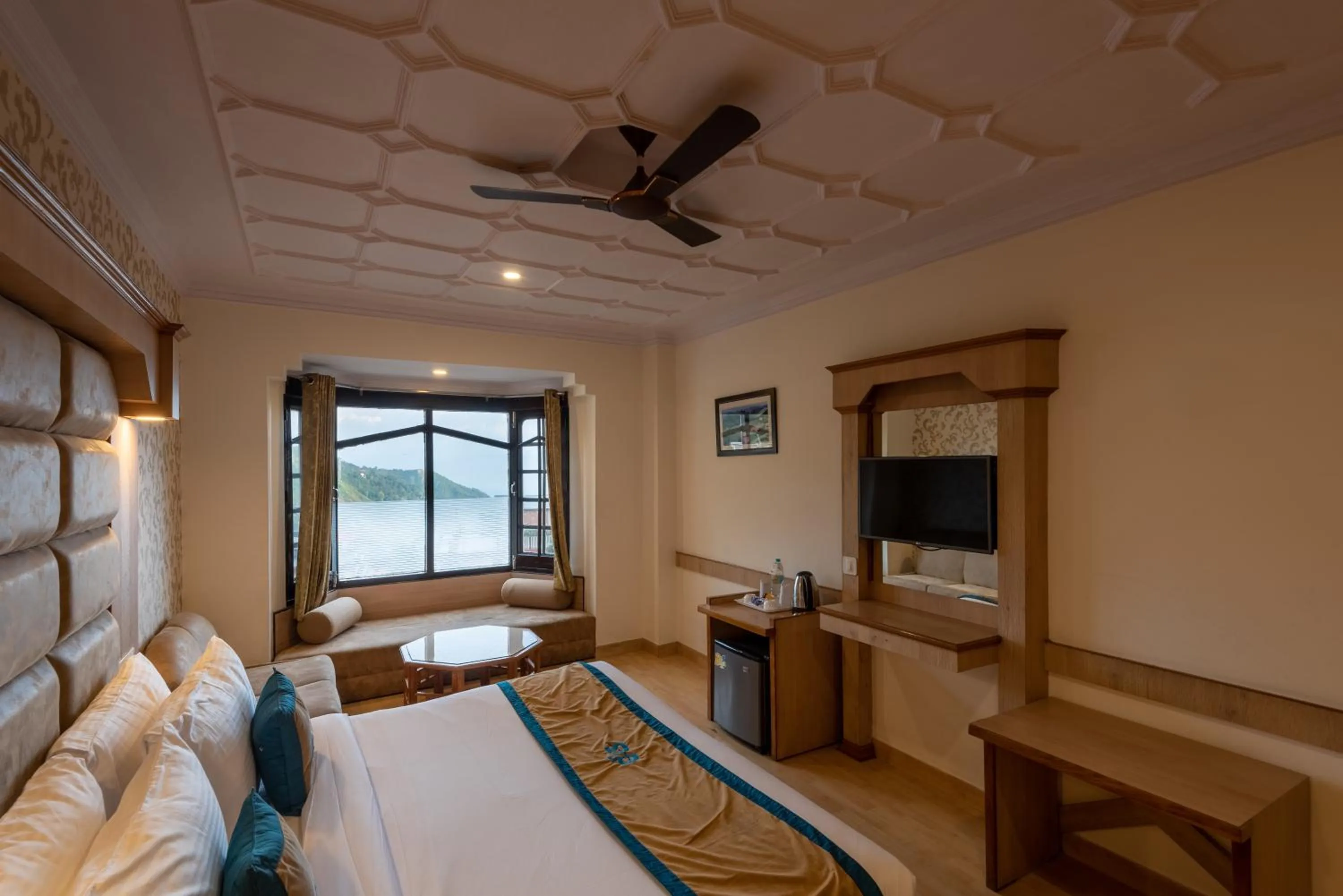 Communal lounge/ TV room in Meghavan Resort By DLS Hotels