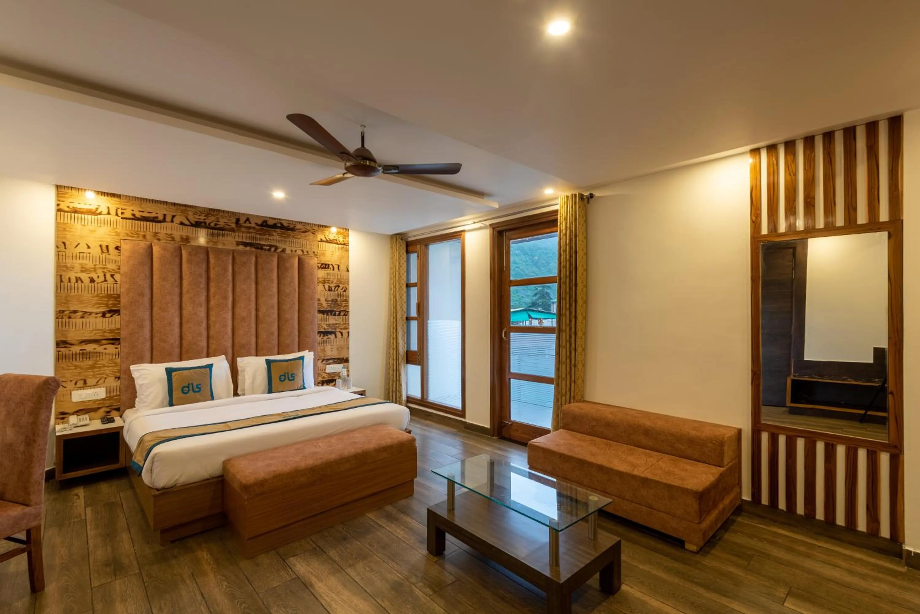 Bed in Meghavan Resort By DLS Hotels