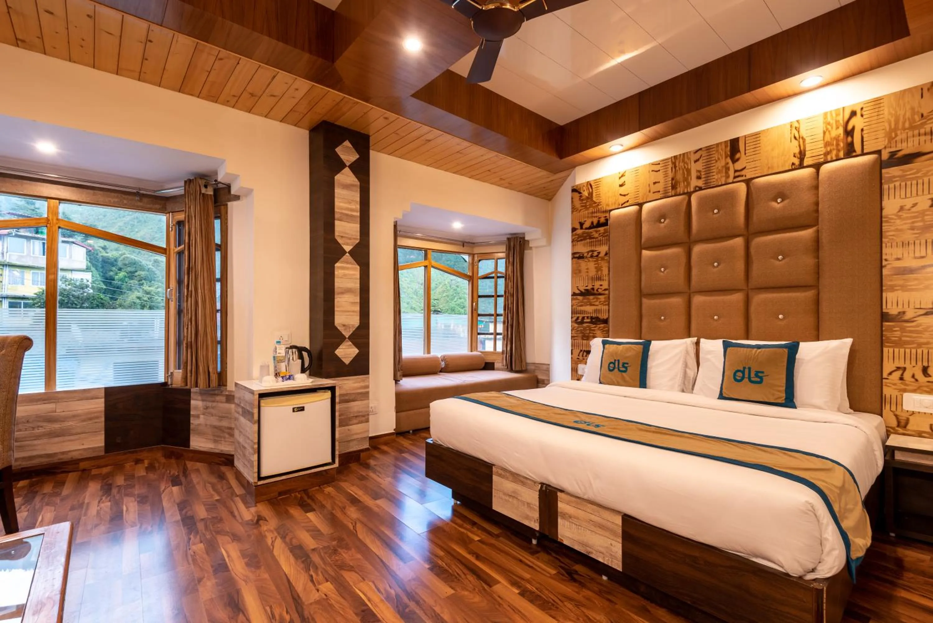 Bed in Meghavan Resort By DLS Hotels