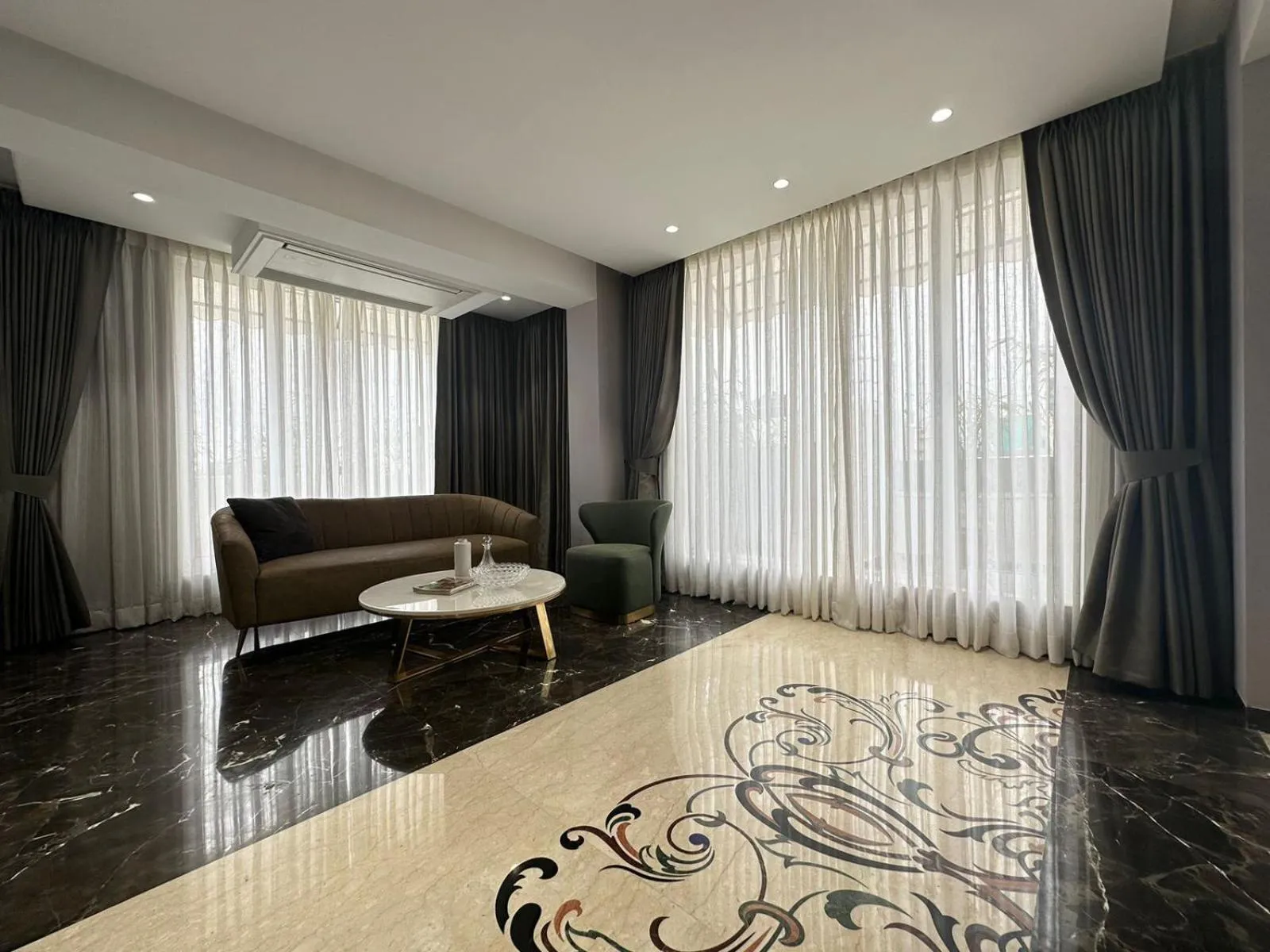 Seating area in Alba Inn, Vijay Nagar