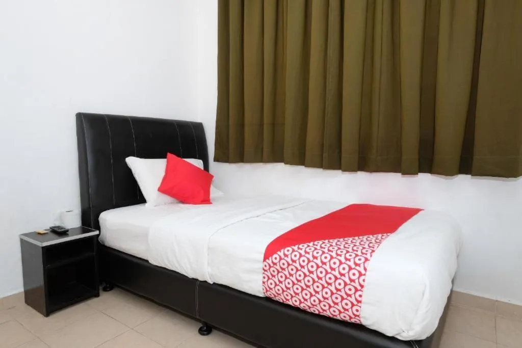 Bed in Hotel De'light Villa