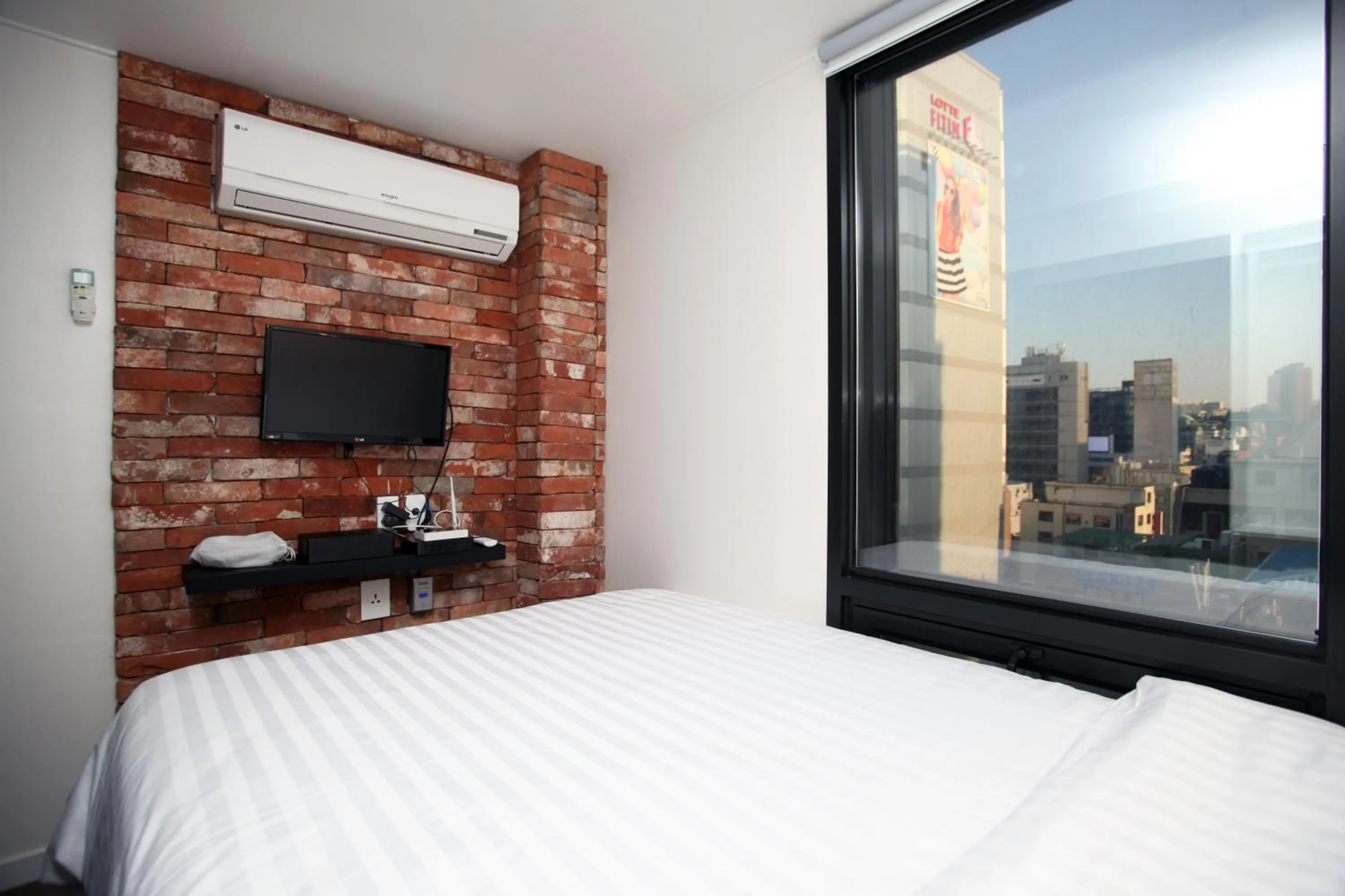 Photo of the whole room, Bed in KSTAR METRO Hotel