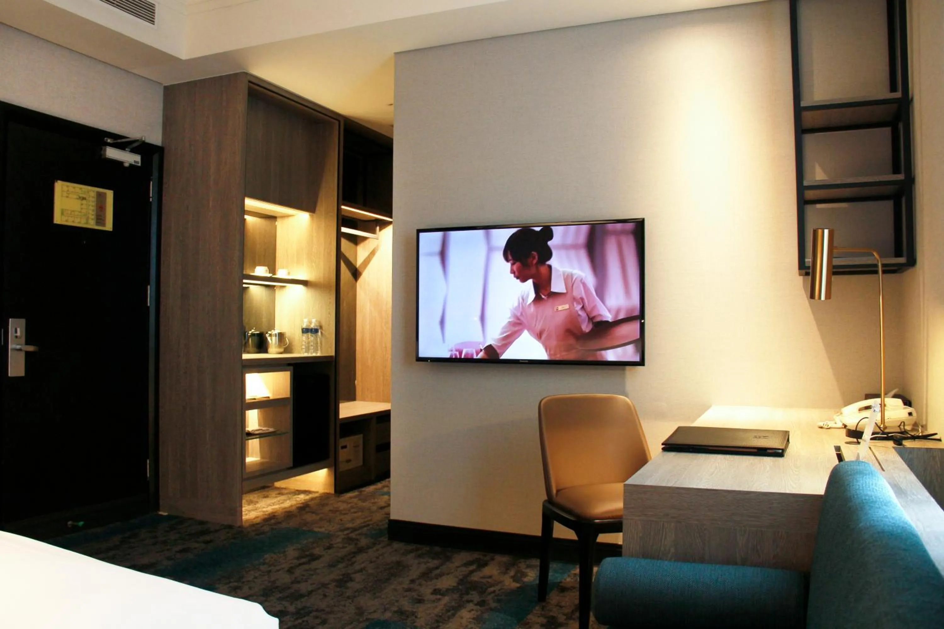 Photo of the whole room, Bed in Queena Plaza Hotel