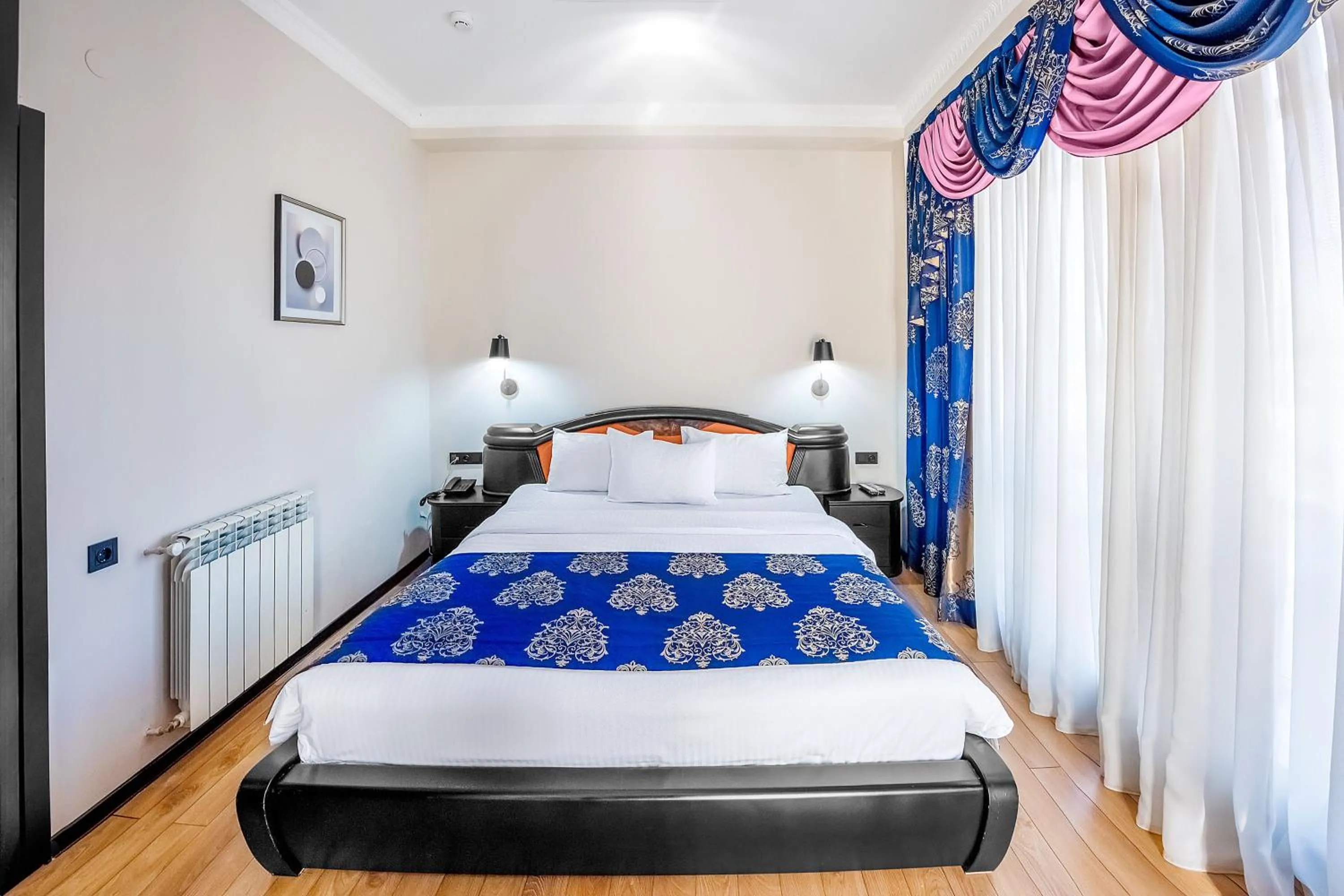 Bed in Cron Palace kosher Tbilisi Hotel