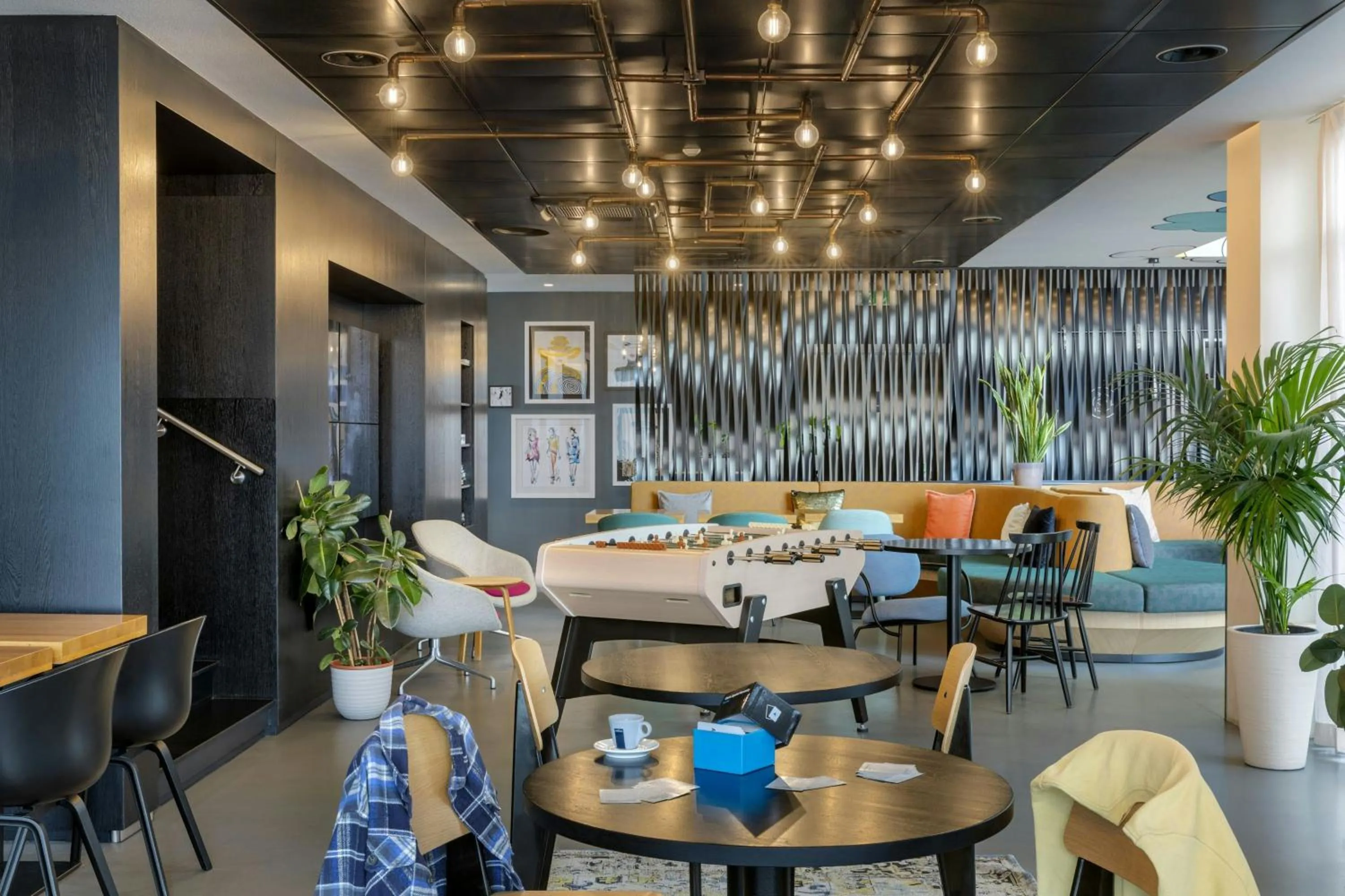 Lobby or reception in Moxy Milan Malpensa Airport