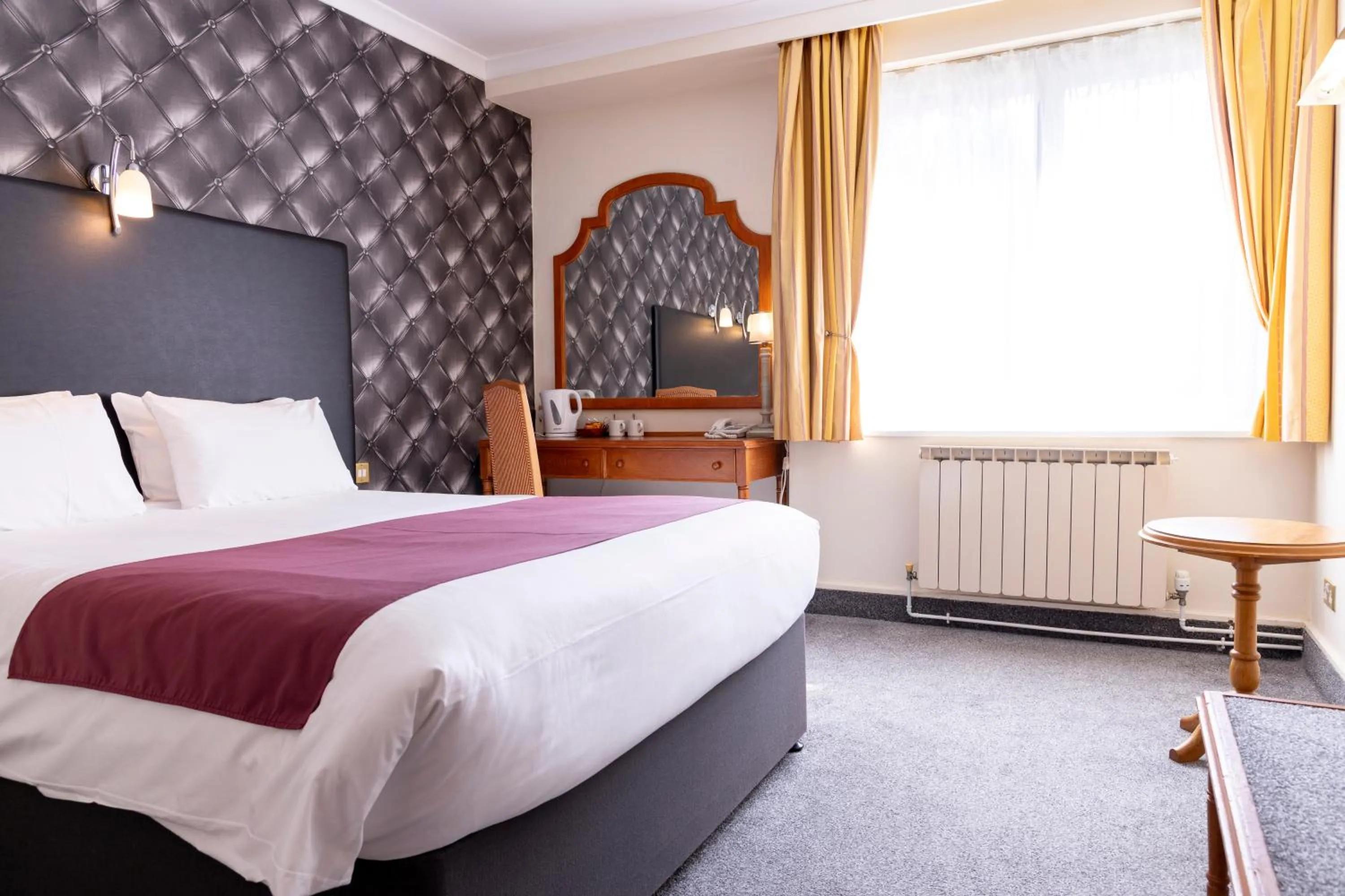 Bed in Roebuck by Greene King Inns