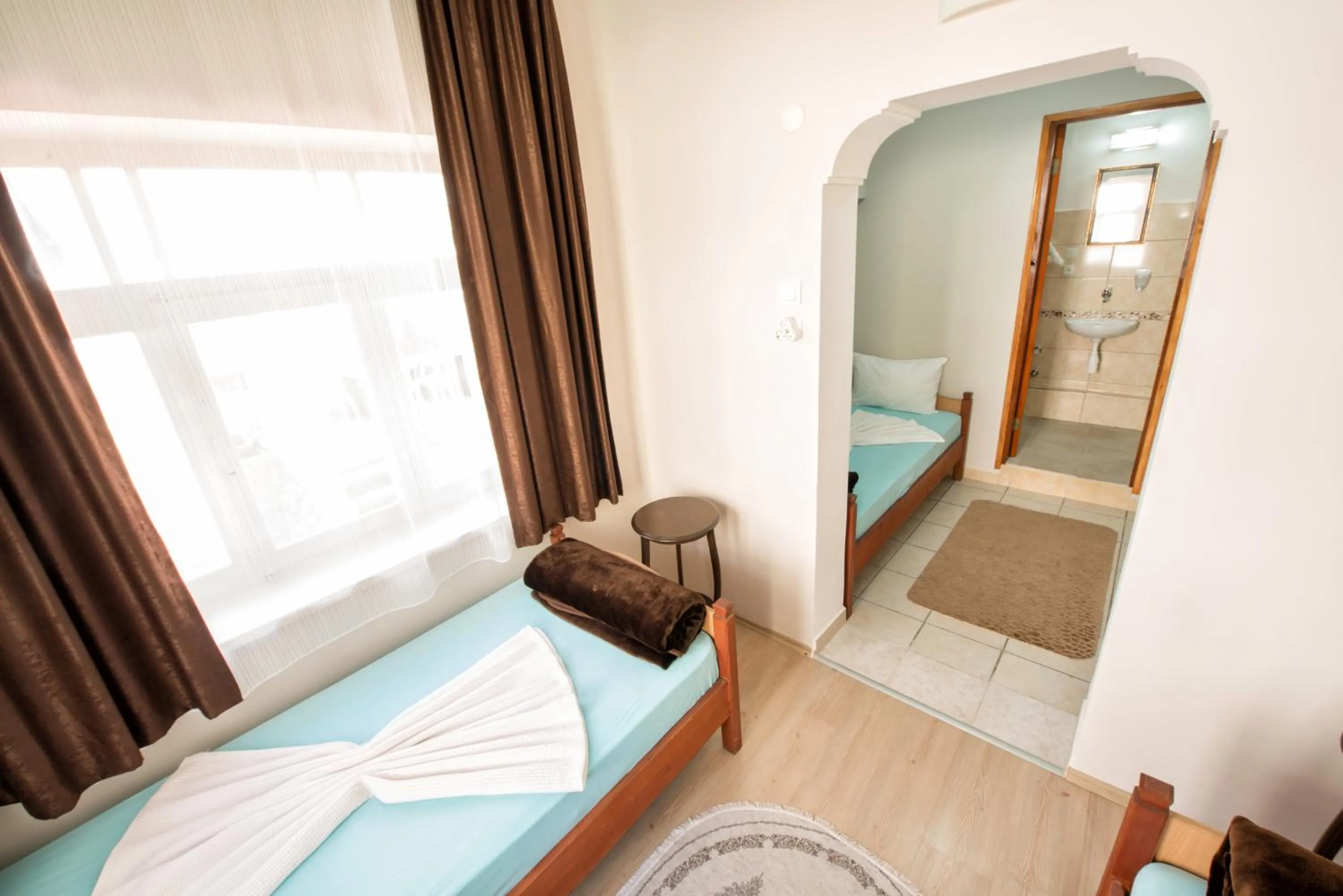 Bed in Yellow Rose Pansiyon