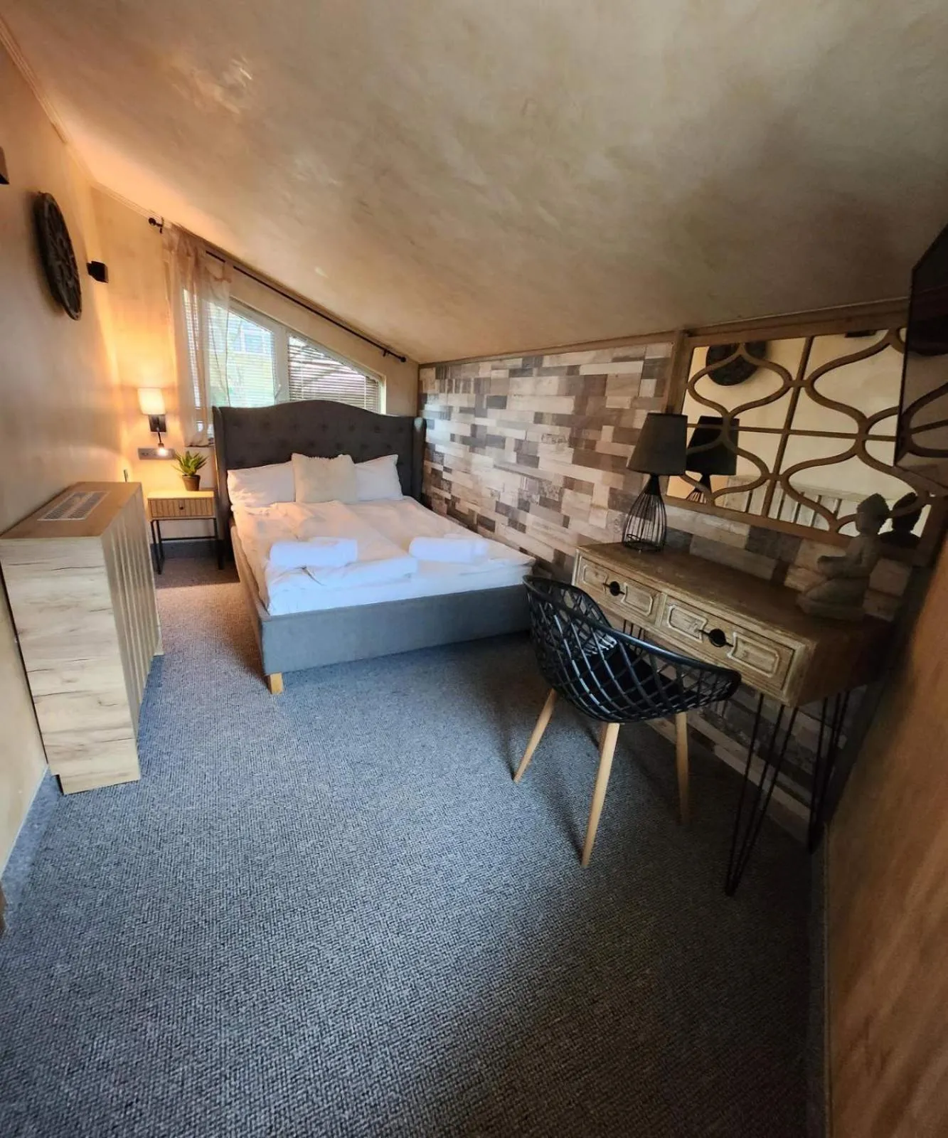 Bed in Jorela Family Hotel