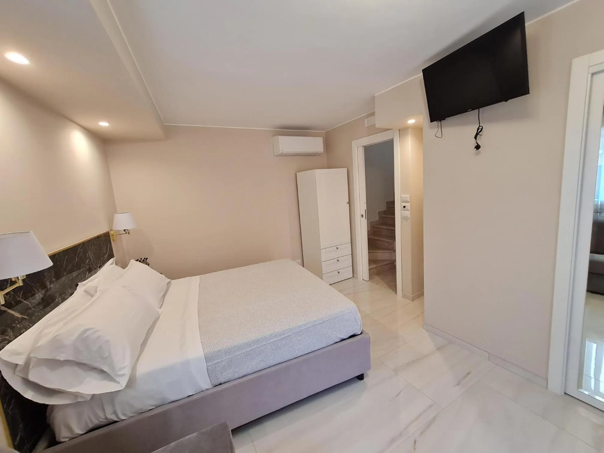 Bed in EPONIMI ROOMs