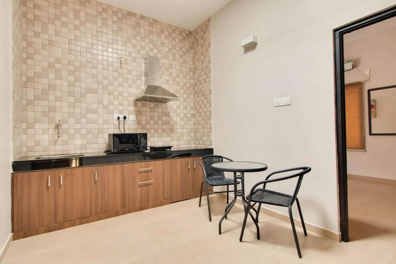 Kitchen or kitchenette in Corner Stay Serviced Apartment-Racecourse