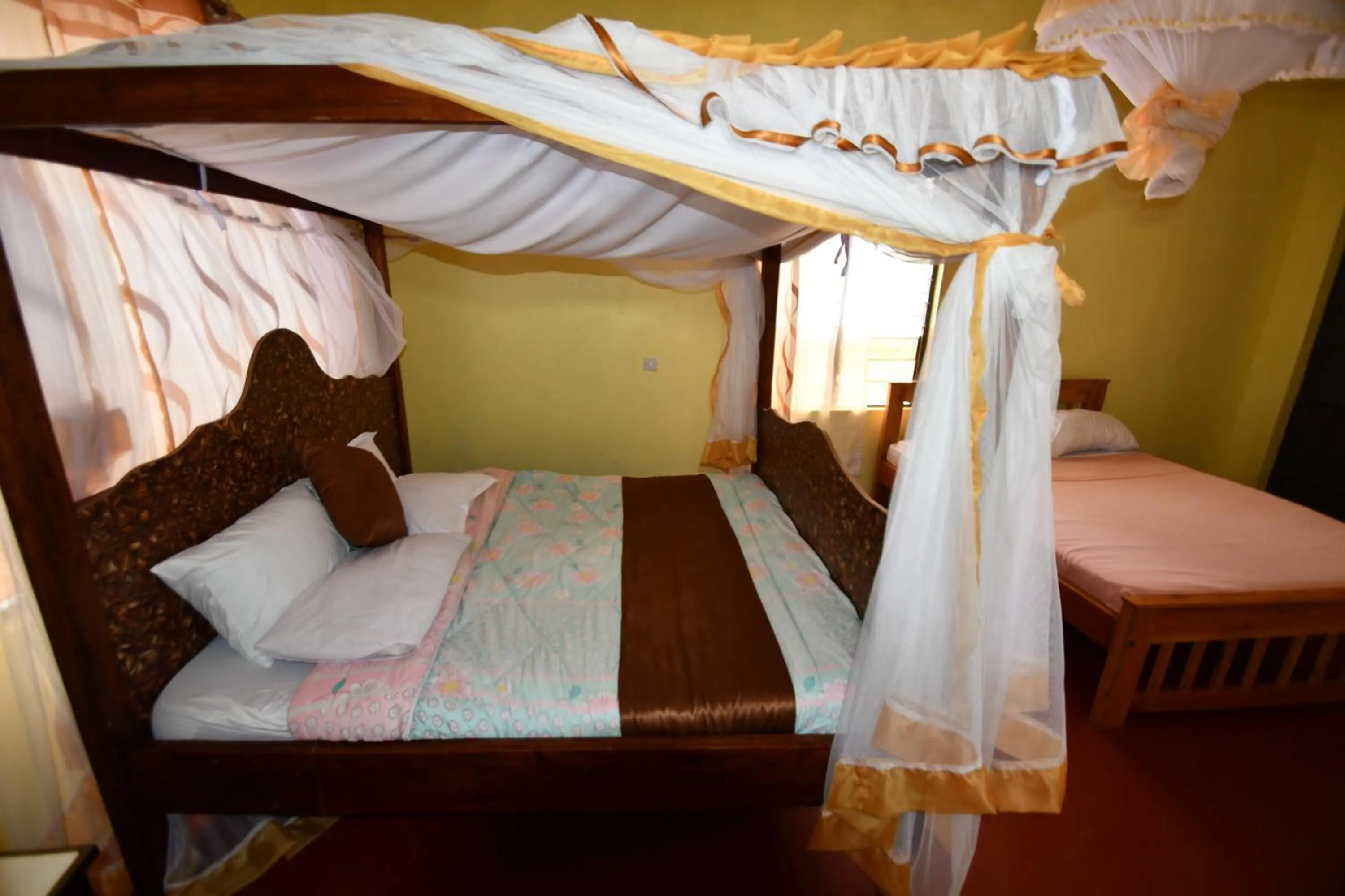 Bed in Tausa Tsavo Eco Lodge