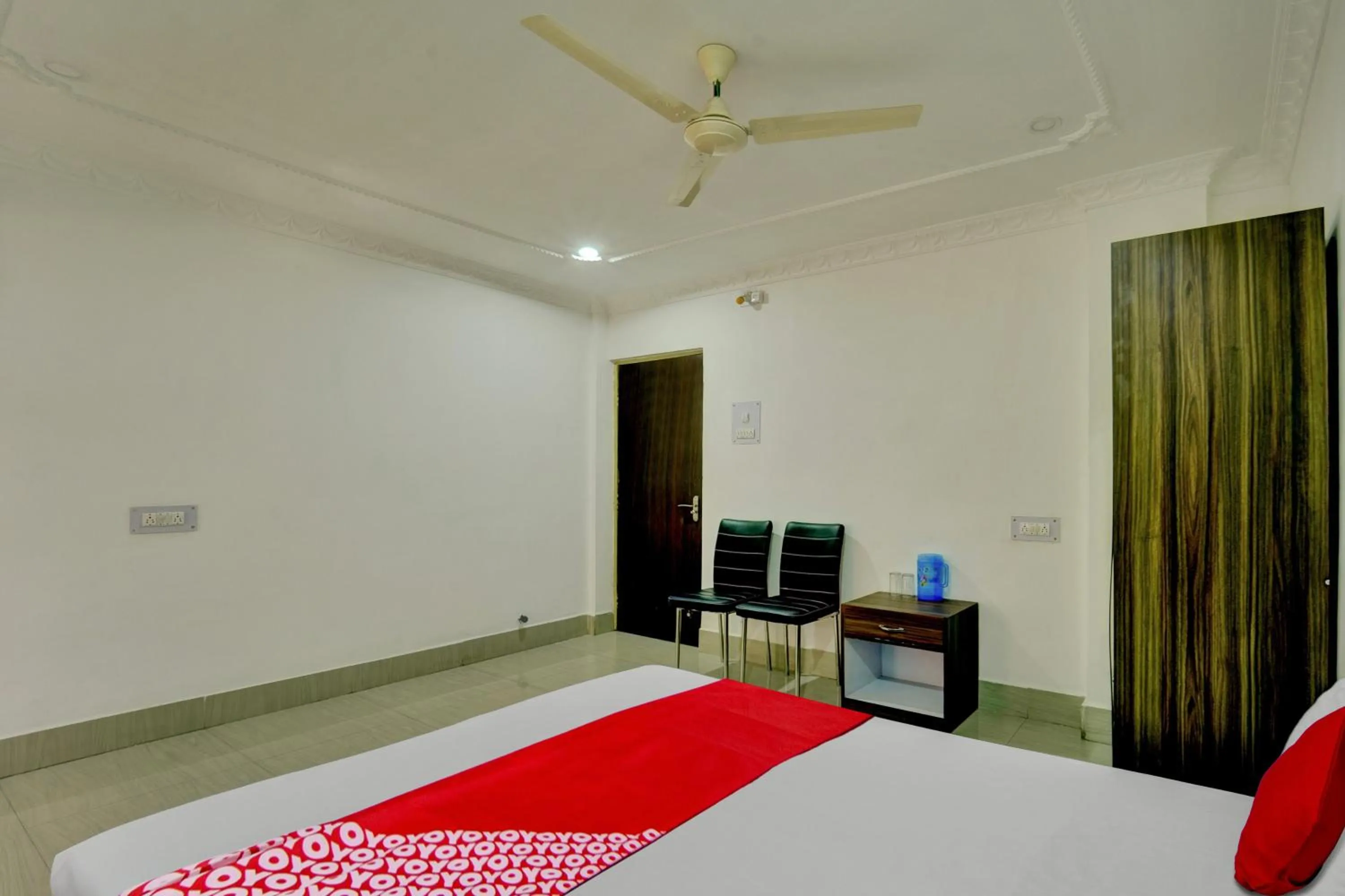 Bedroom in Hotel O Shakti Inn