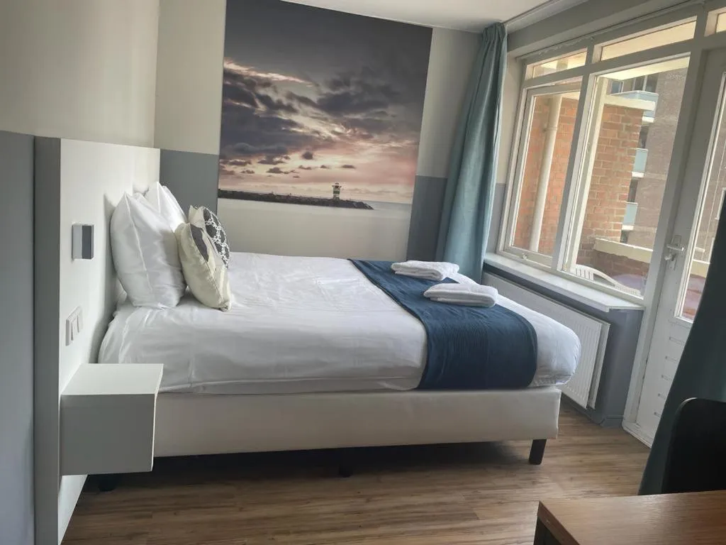 Bed in Hotel Andante aan Zee