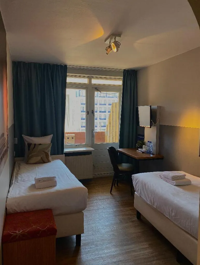 Bed in Hotel Andante aan Zee