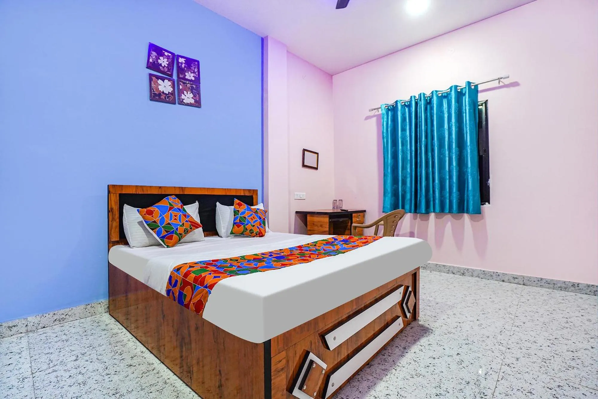 Bed in FabExpress Evaan Deluxe Rooms