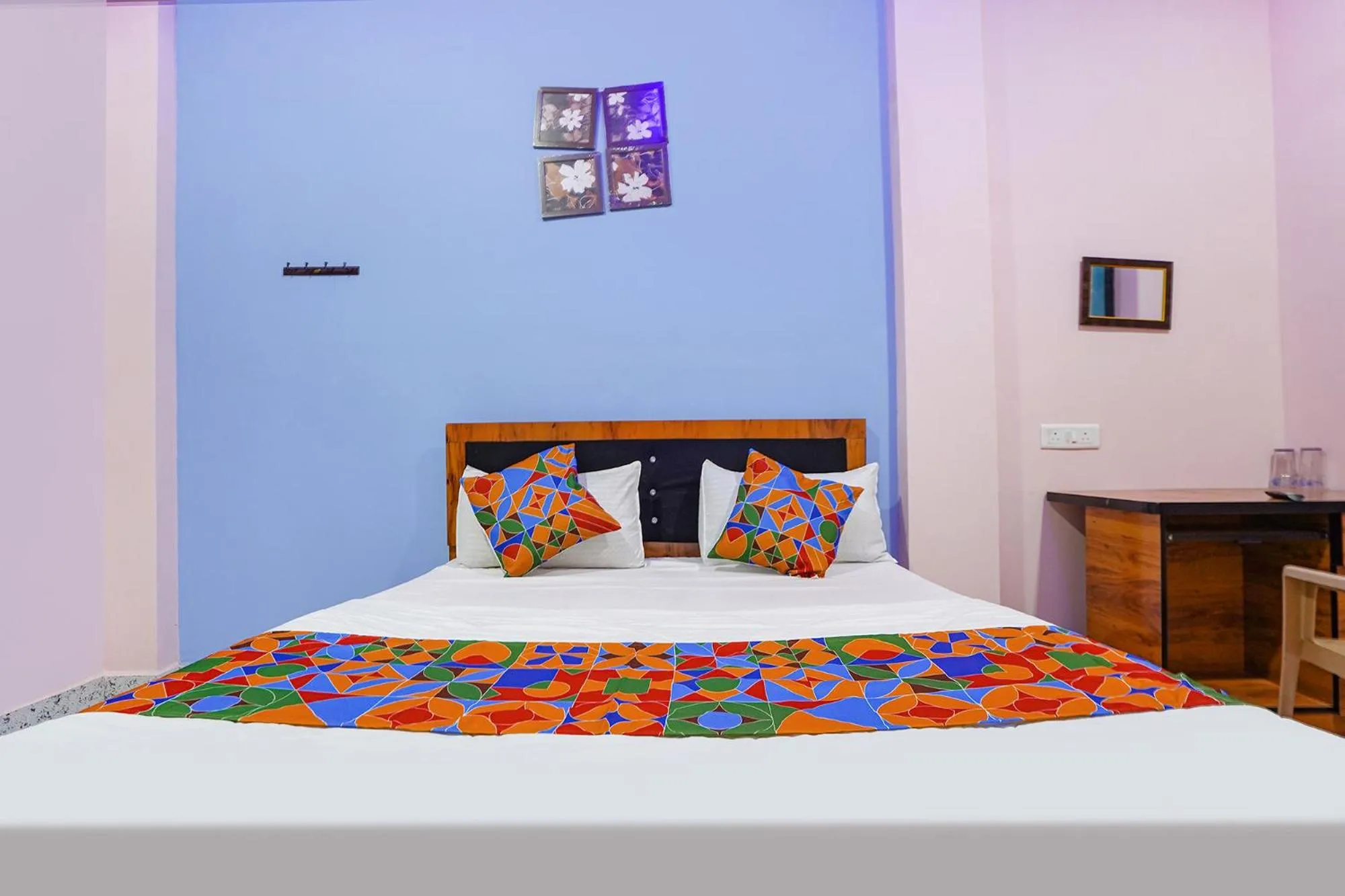 Bed in FabExpress Evaan Deluxe Rooms