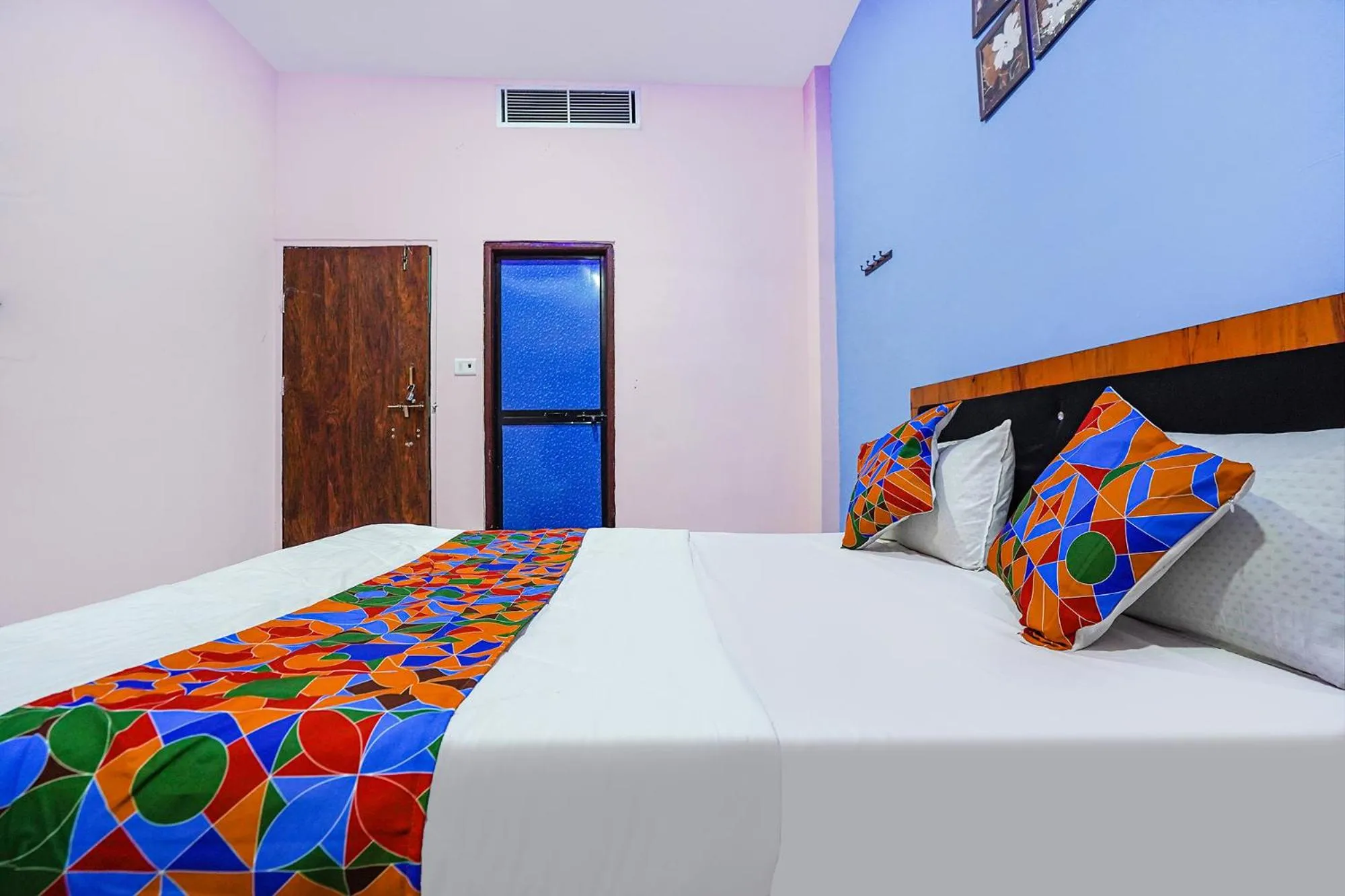 Bed in FabExpress Evaan Deluxe Rooms