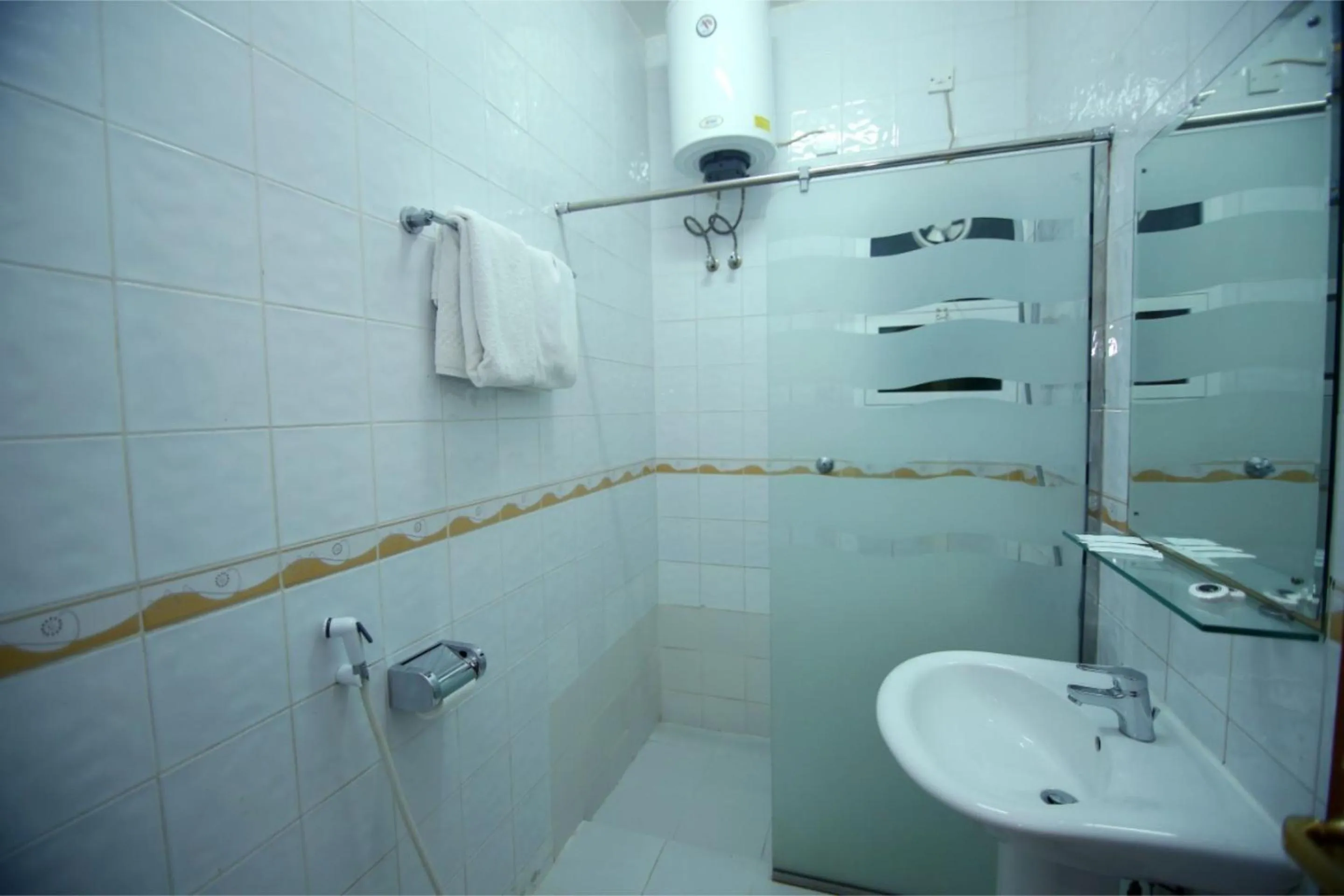 Bathroom in Super OYO 151 Manam 2 Hotel Apartment