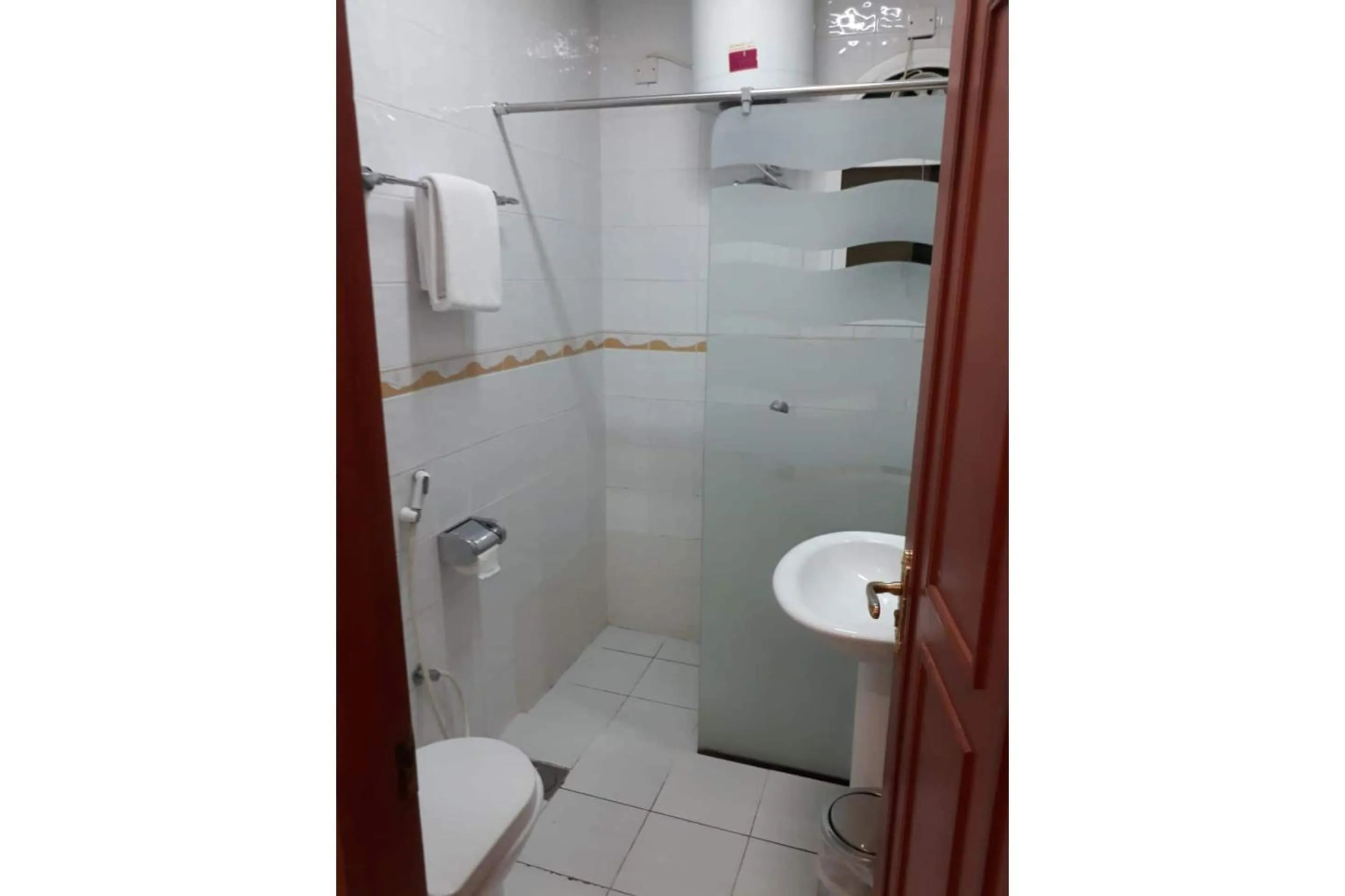 Bathroom in Super OYO 152 Manam 1 Hotel Apartment