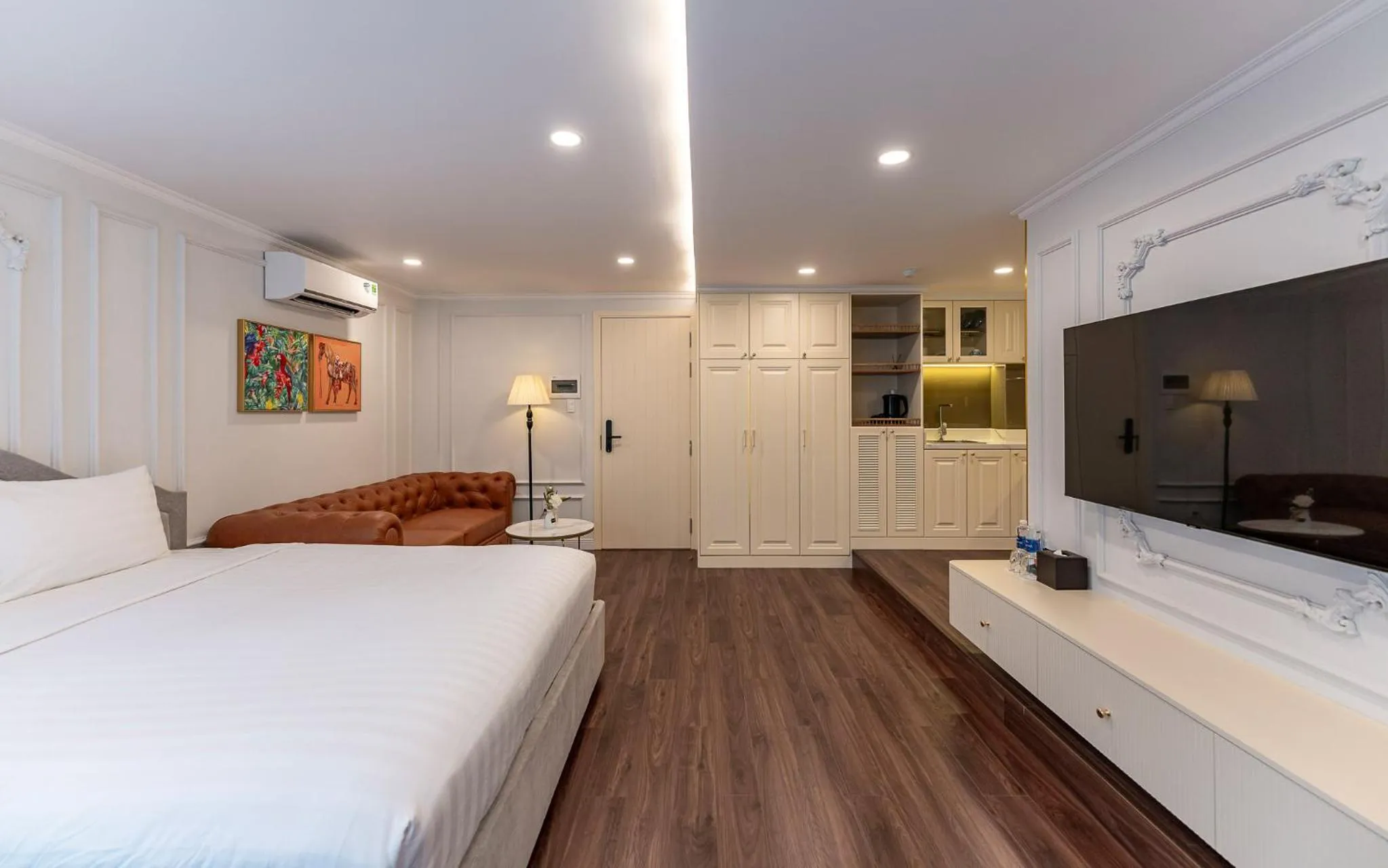 Bed in Golden Sun Apartment & Hotel