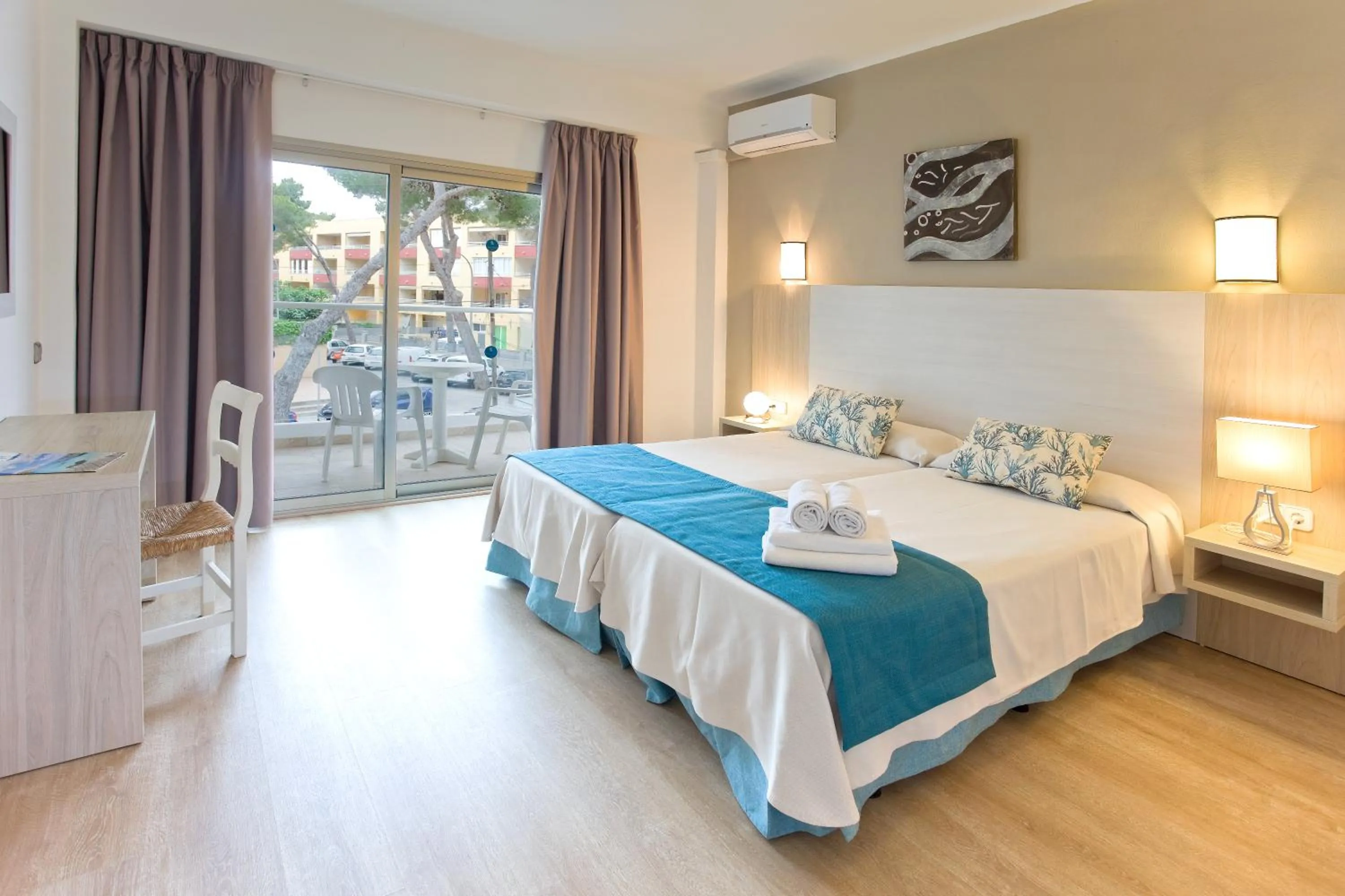 Photo of the whole room, Bed in Petit Garden Hotel by Flacalco