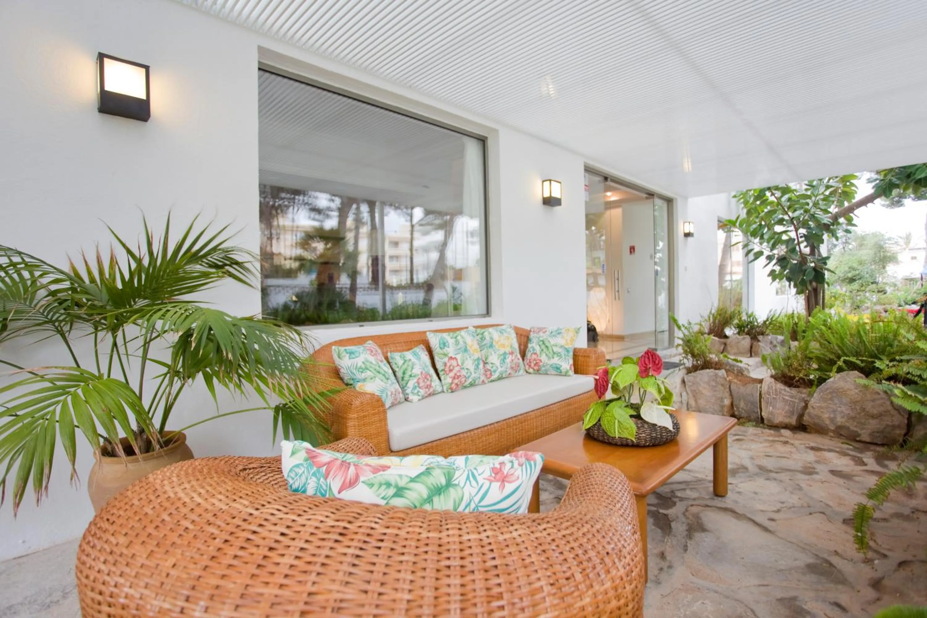 Property building in Petit Garden Hotel by Flacalco