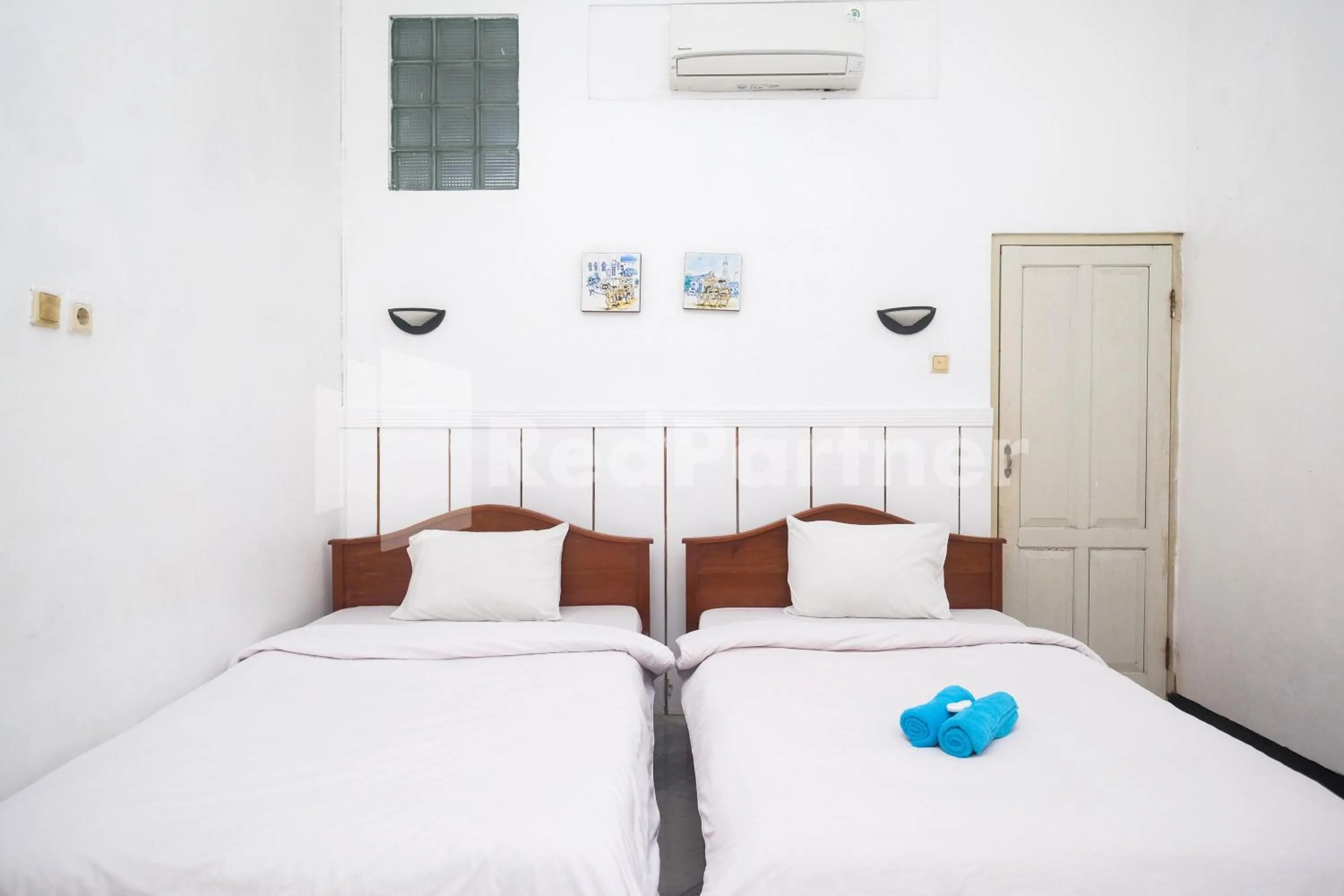 Bed in Hotel Limaran 1 Syariah Malioboro Mitra RedDoorz