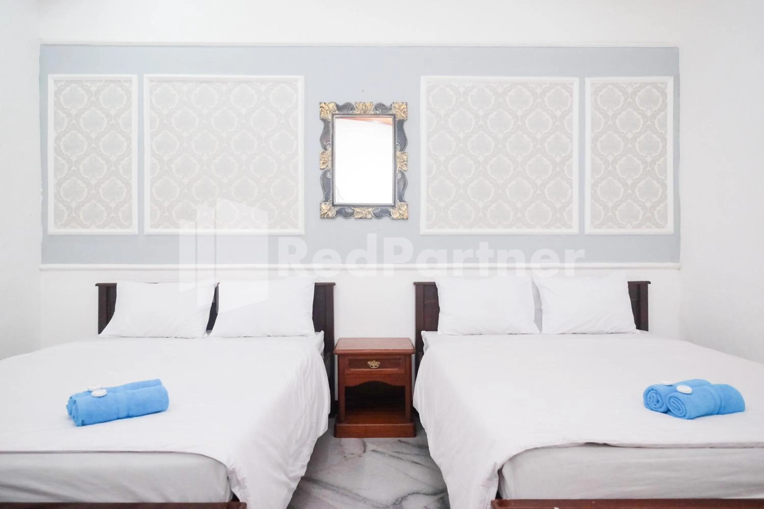 Bed in Hotel Limaran 1 Syariah Malioboro Mitra RedDoorz