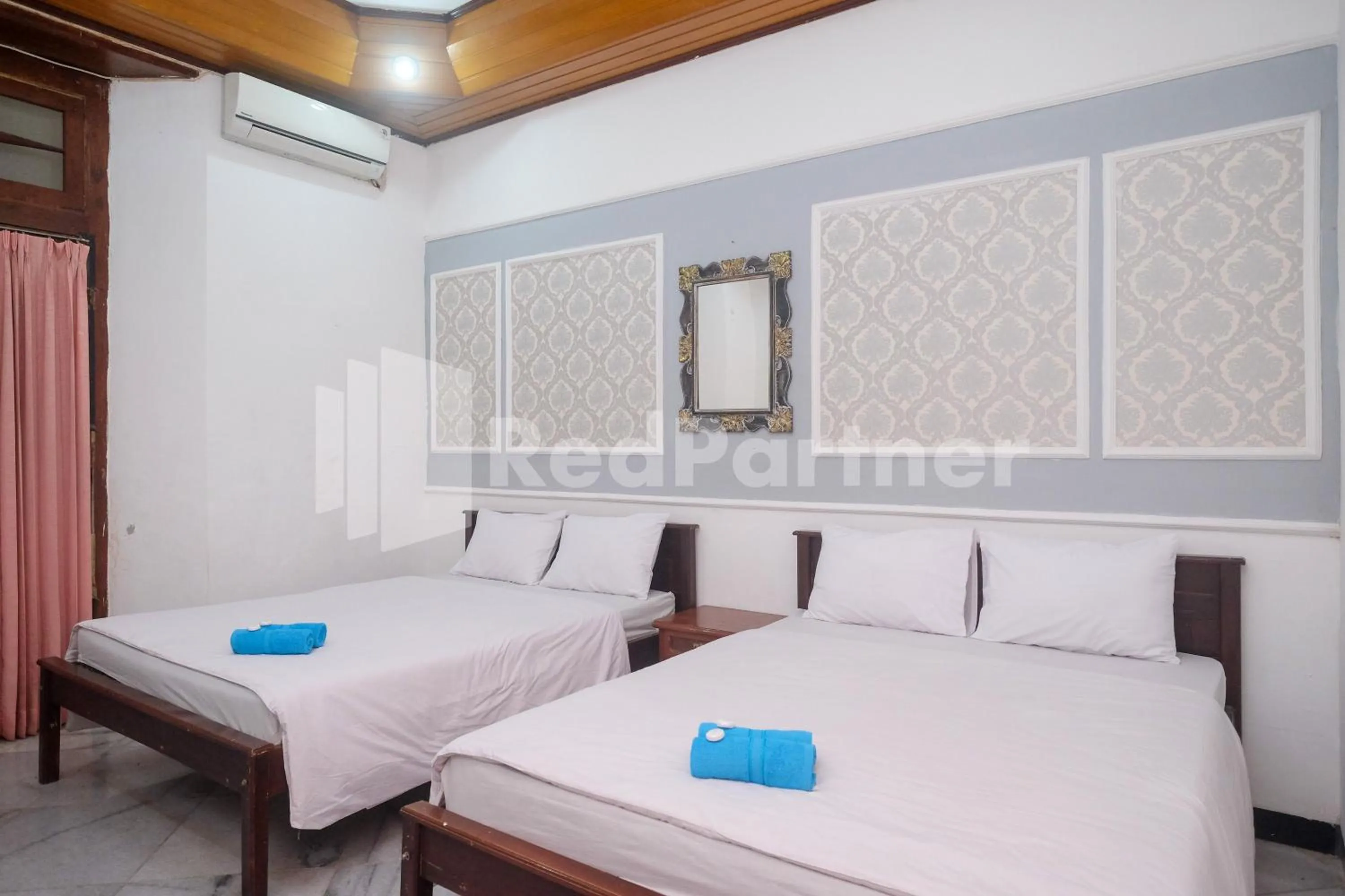 Bed in Hotel Limaran 1 Syariah Malioboro Mitra RedDoorz