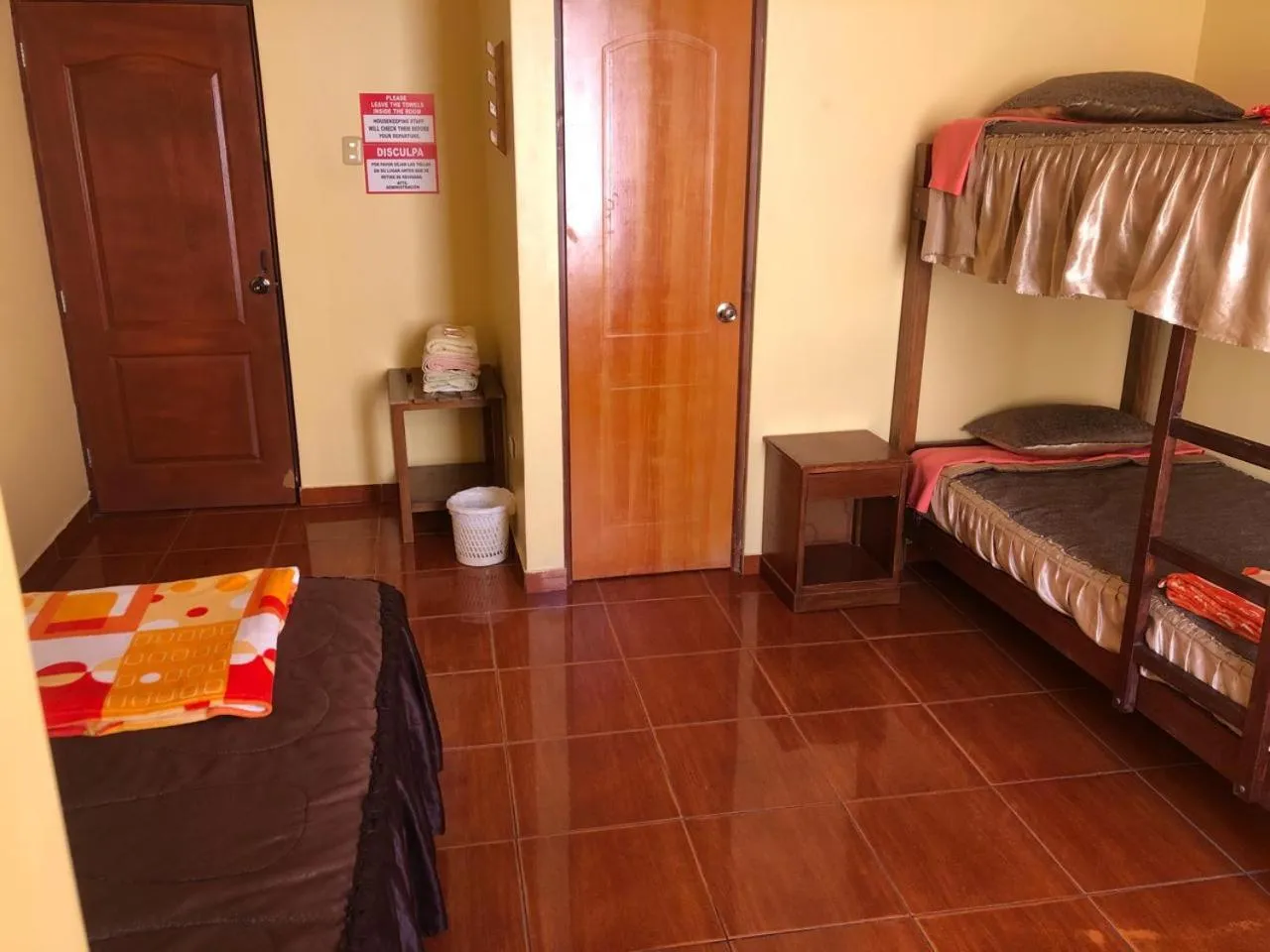 Bed in Hostal Huacachina Sunset