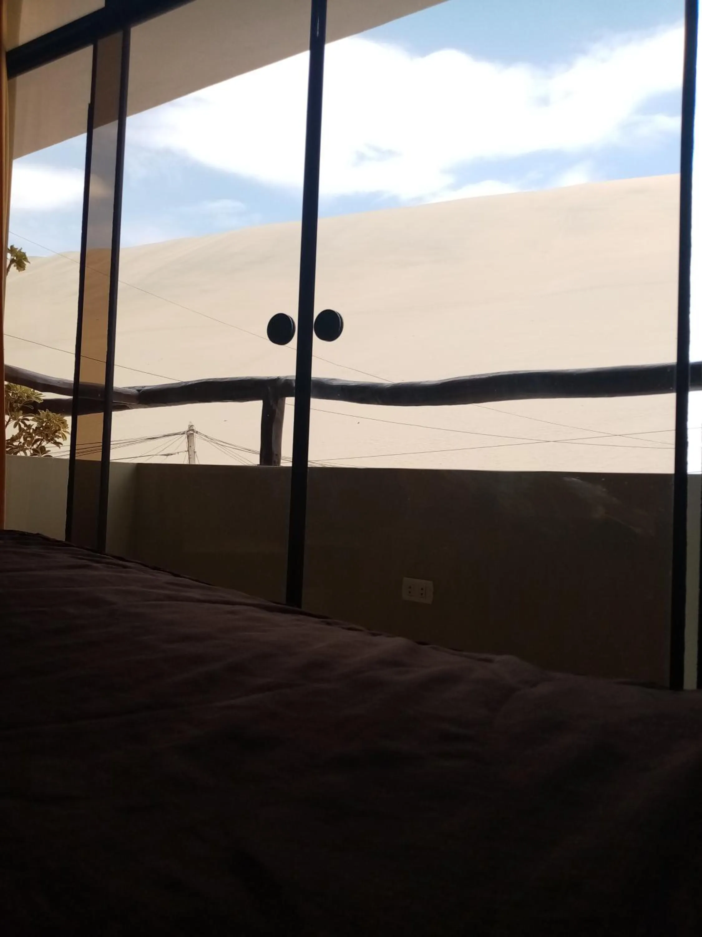 View (from property/room), Bed in Hostal Huacachina Sunset