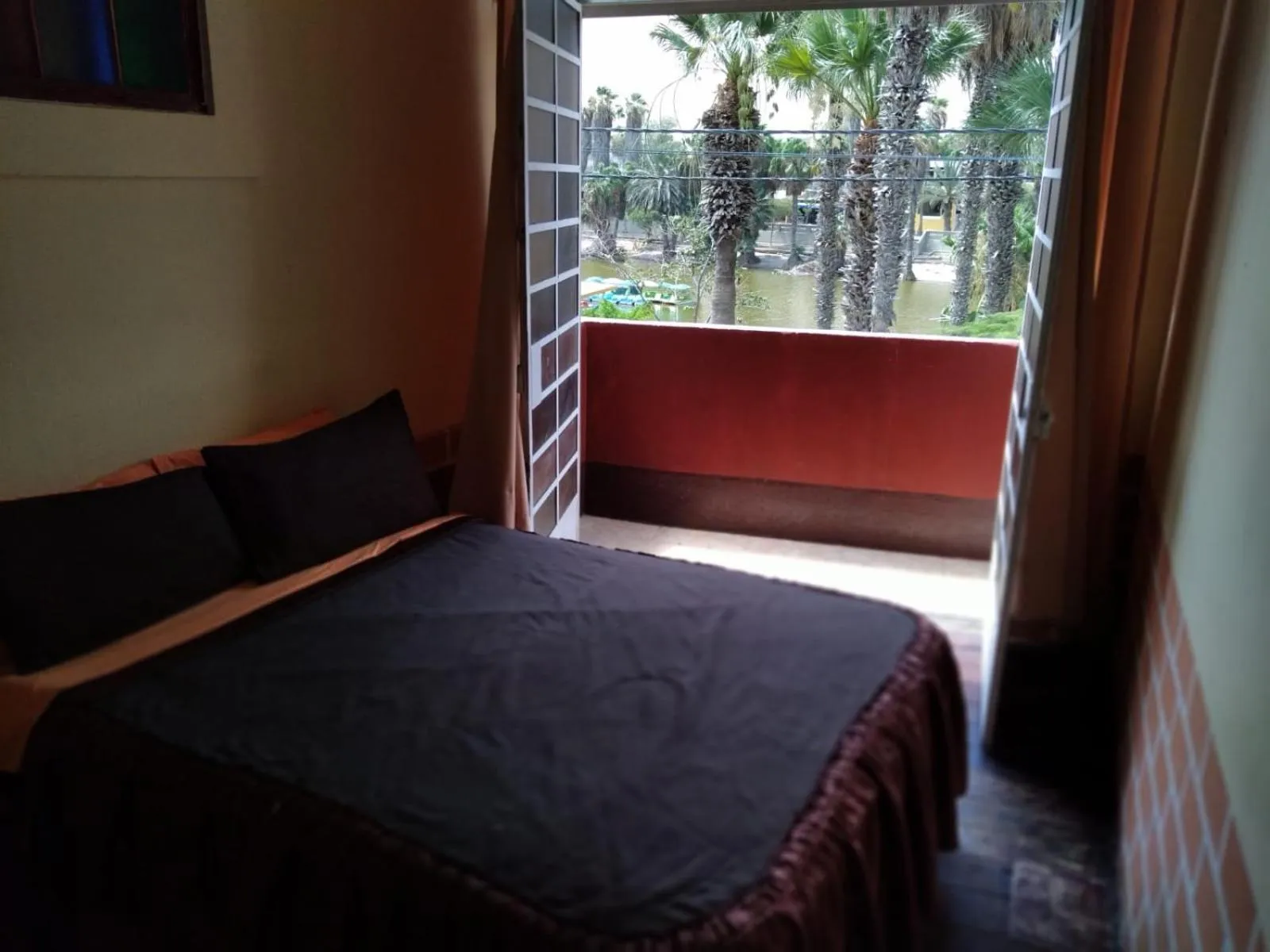 Photo of the whole room, Bed in Hostal Huacachina Sunset