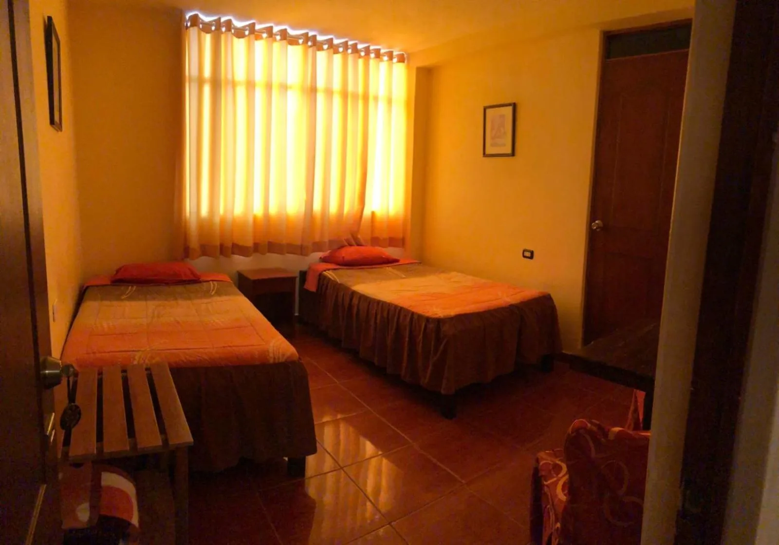 Photo of the whole room, Bed in Hostal Huacachina Sunset