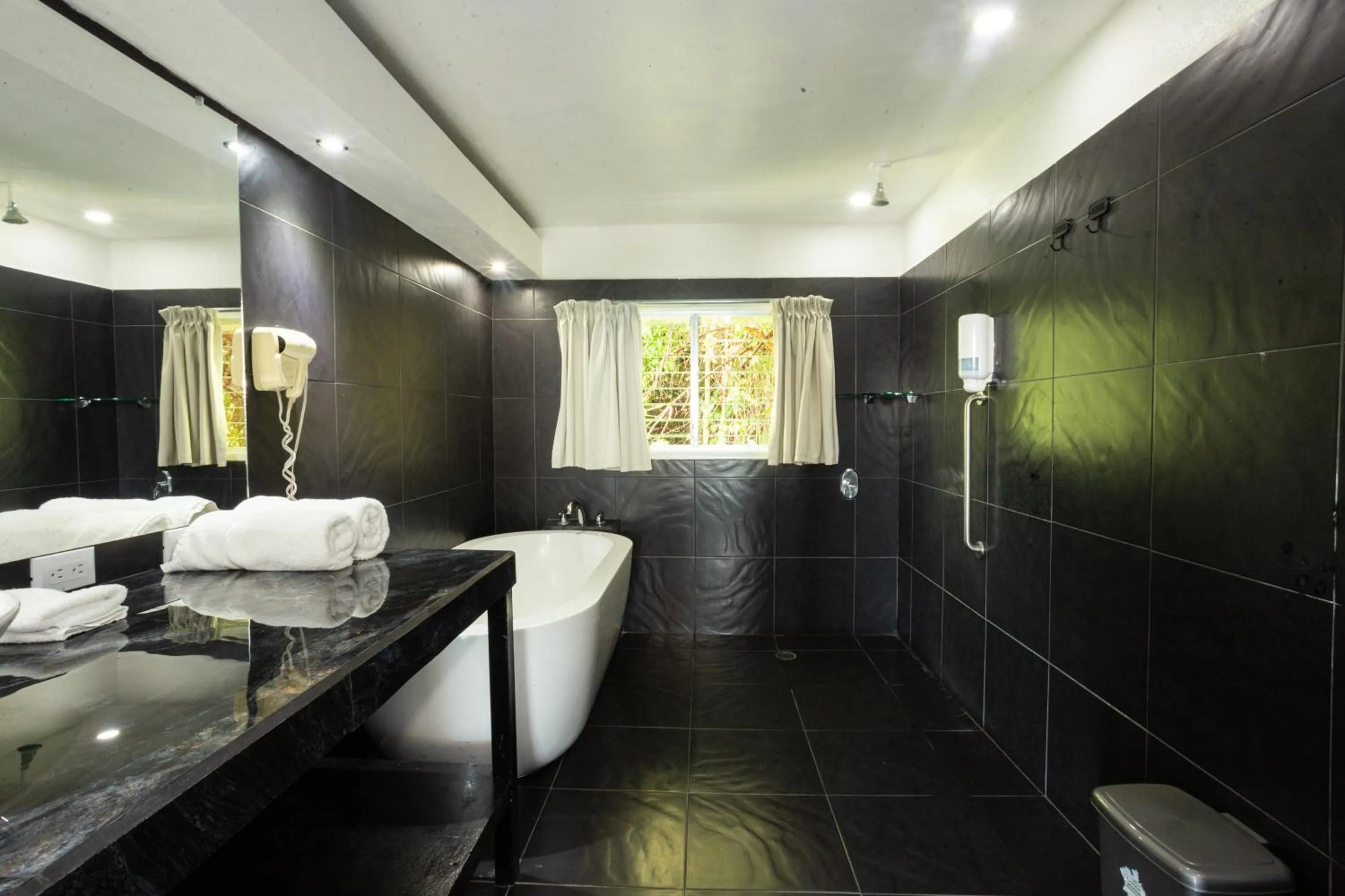 Shower in El Faro Containers Beach Hotel