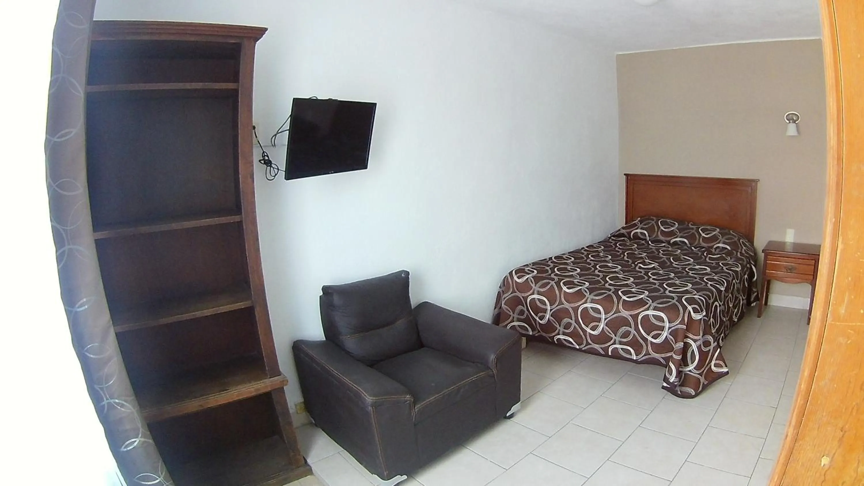 Seating area, Bed in Hotel San Luis