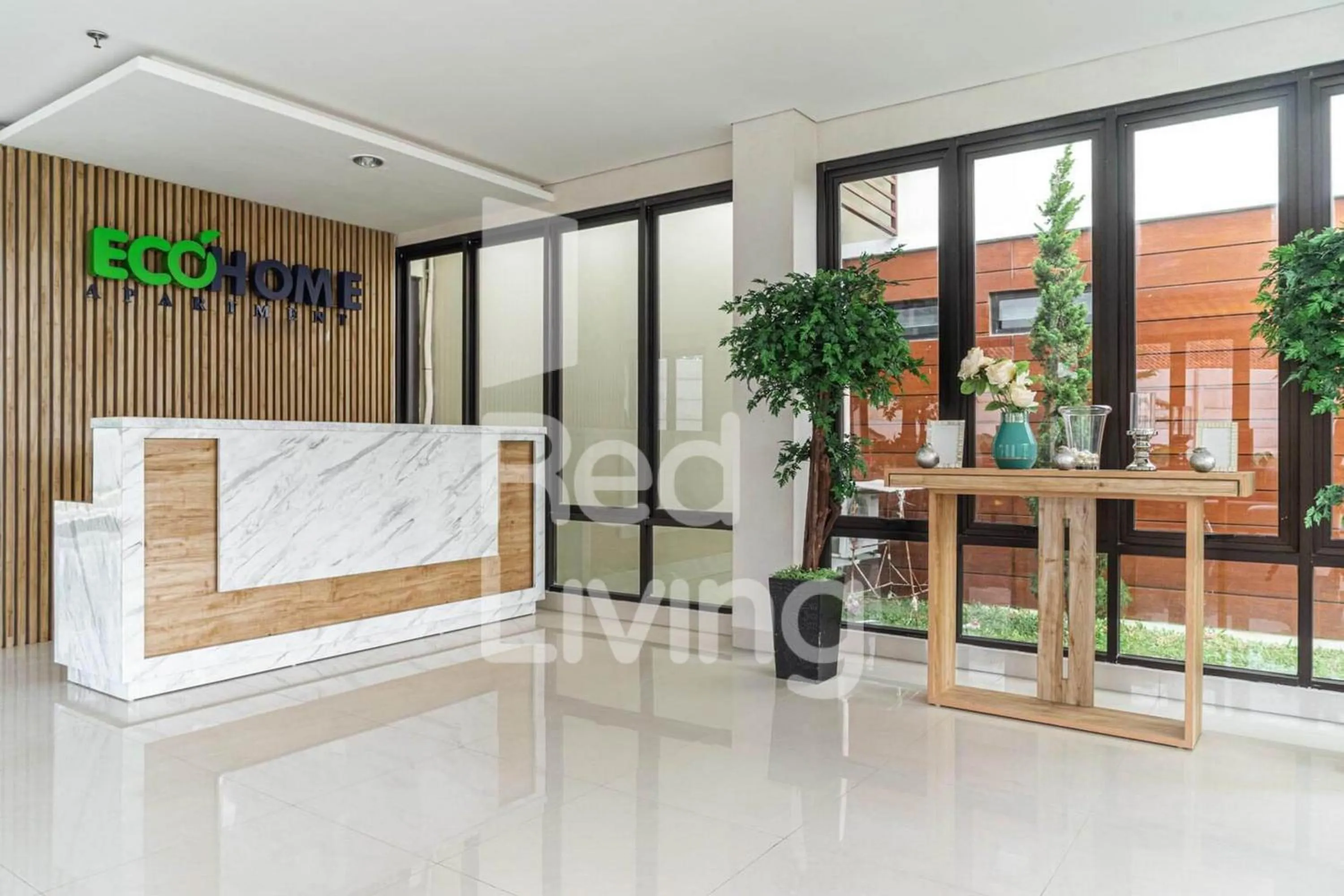 Lobby or reception in RedLiving Apartemen RQ at Ecohome Citra Raya