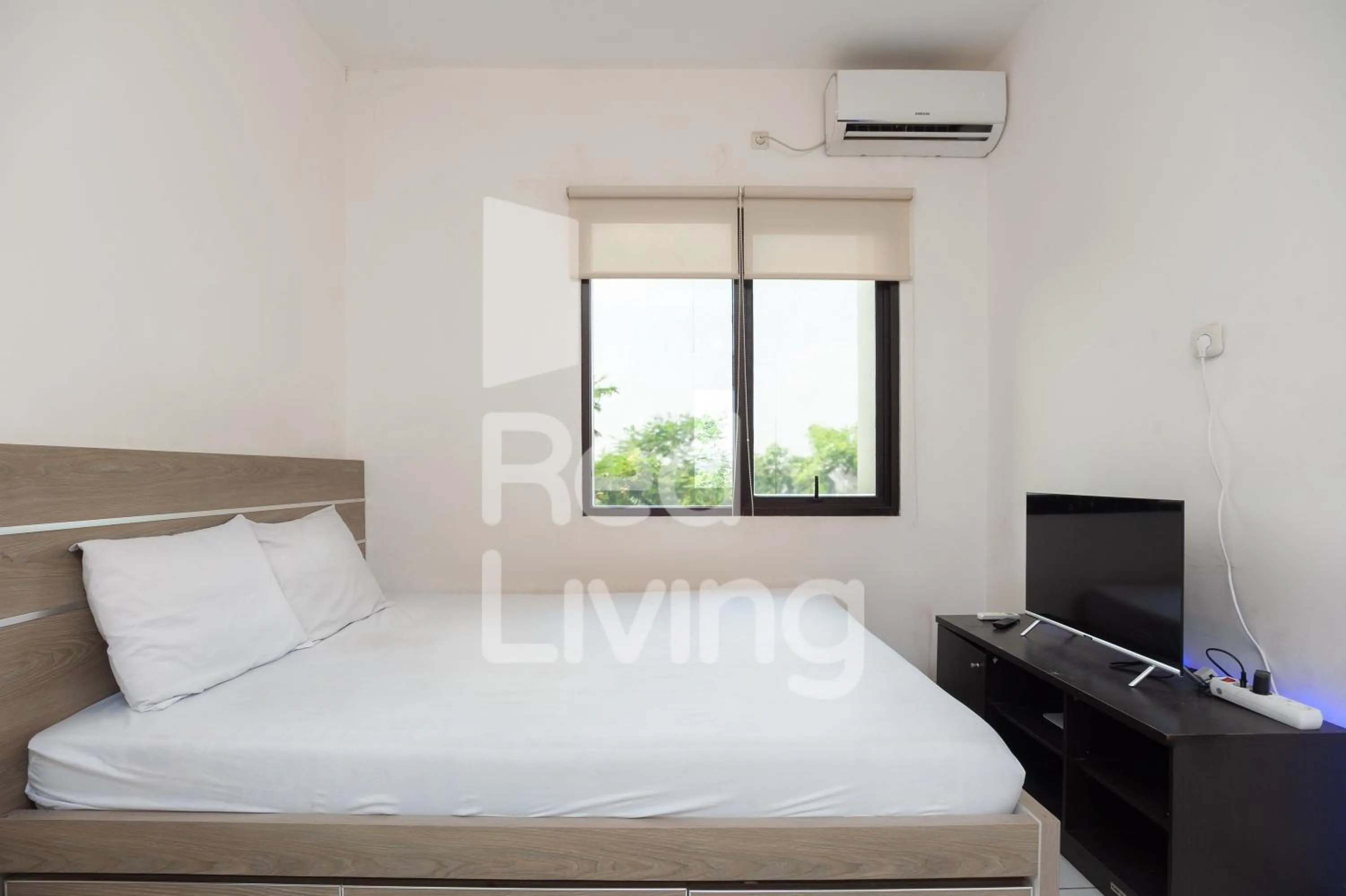 Bed in RedLiving Apartemen RQ at Ecohome Citra Raya