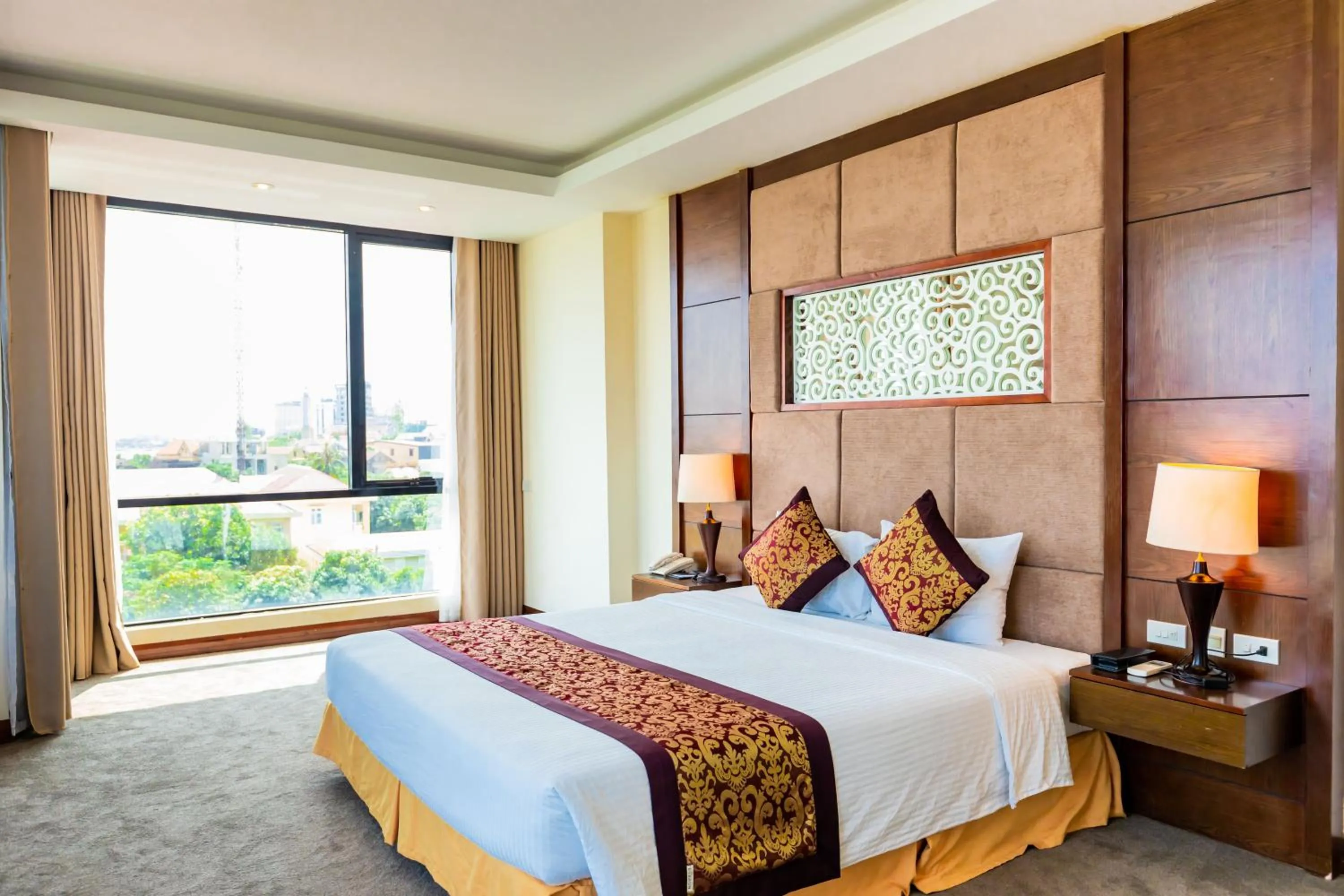 Bed in Muong Thanh Holiday Quang Binh Hotel