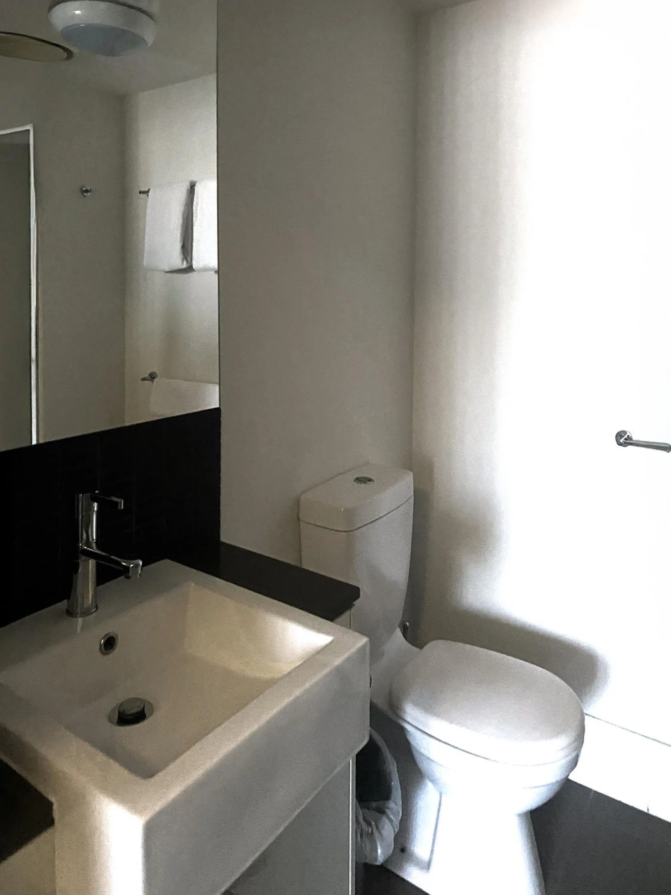 Toilet in Curtis Central Apartments Official