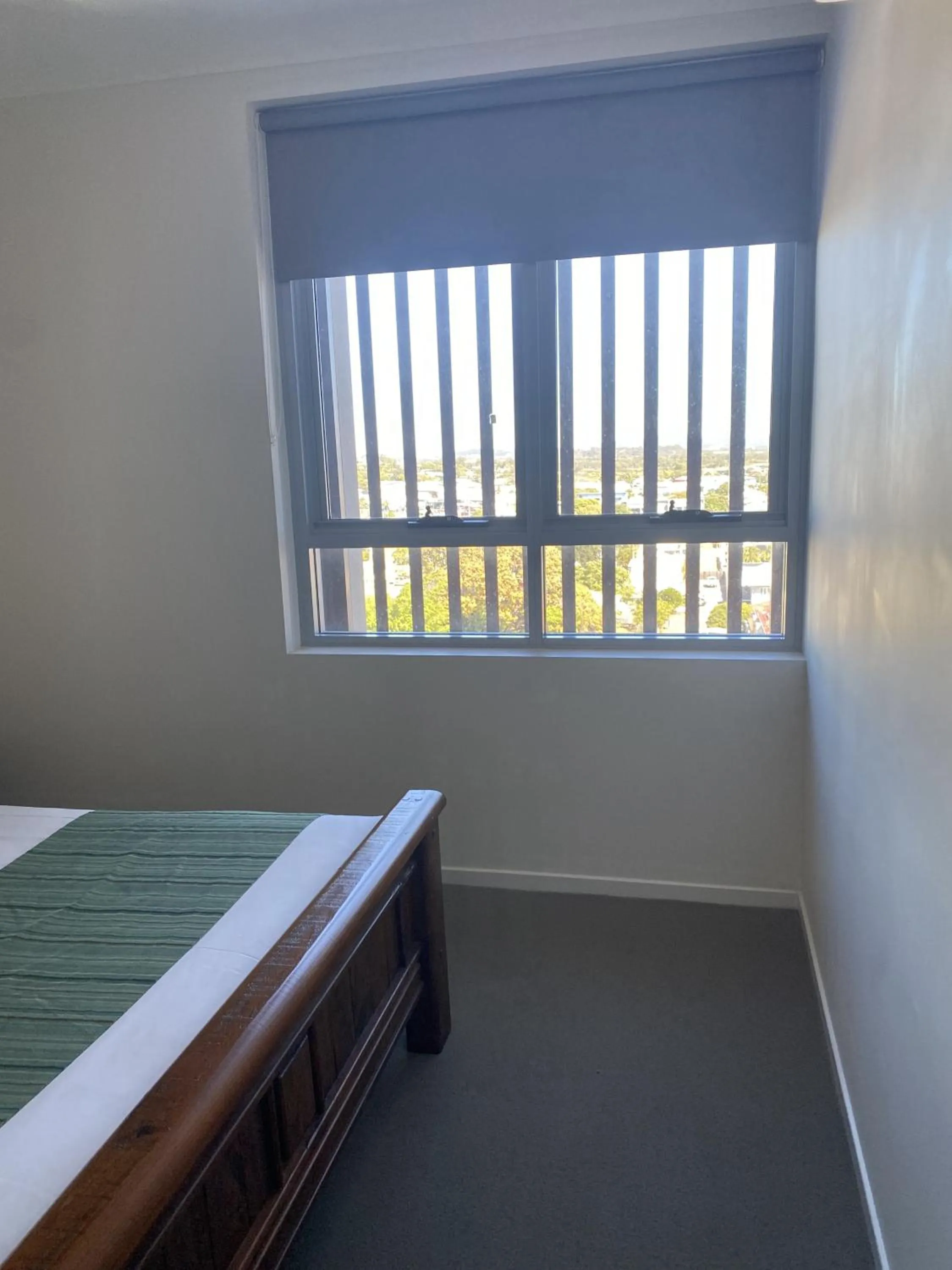 Bed in Curtis Central Apartments Official