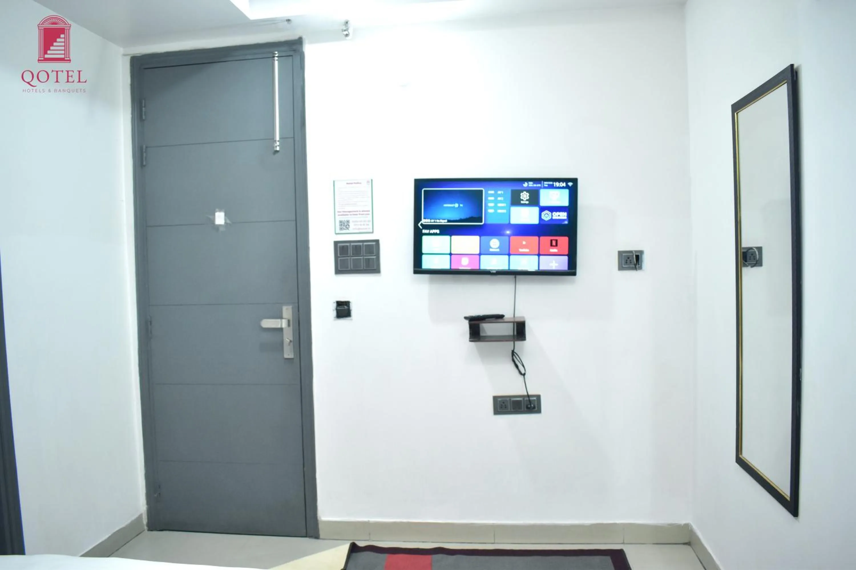 TV and multimedia in Qotel Hotel Rama Rohini Sector-24 Couple Friendly