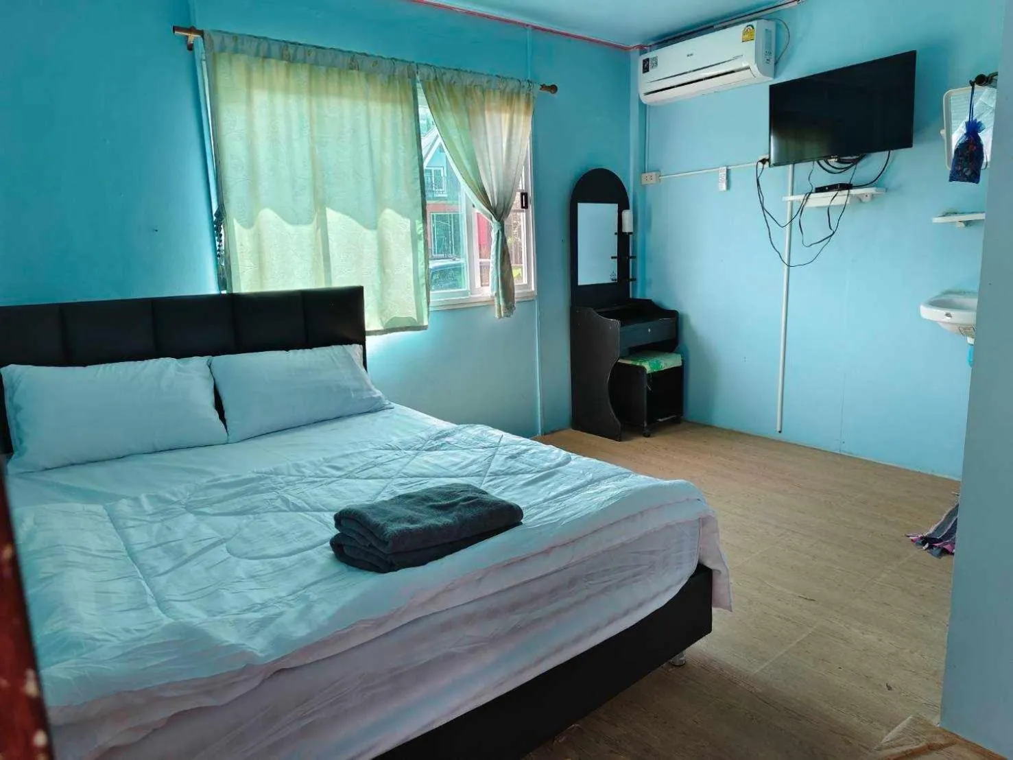 Bed in Inthanon Lao-Ju House