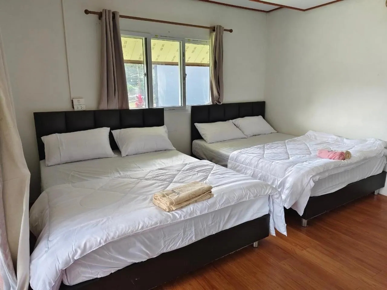 Bed in Inthanon Lao-Ju House