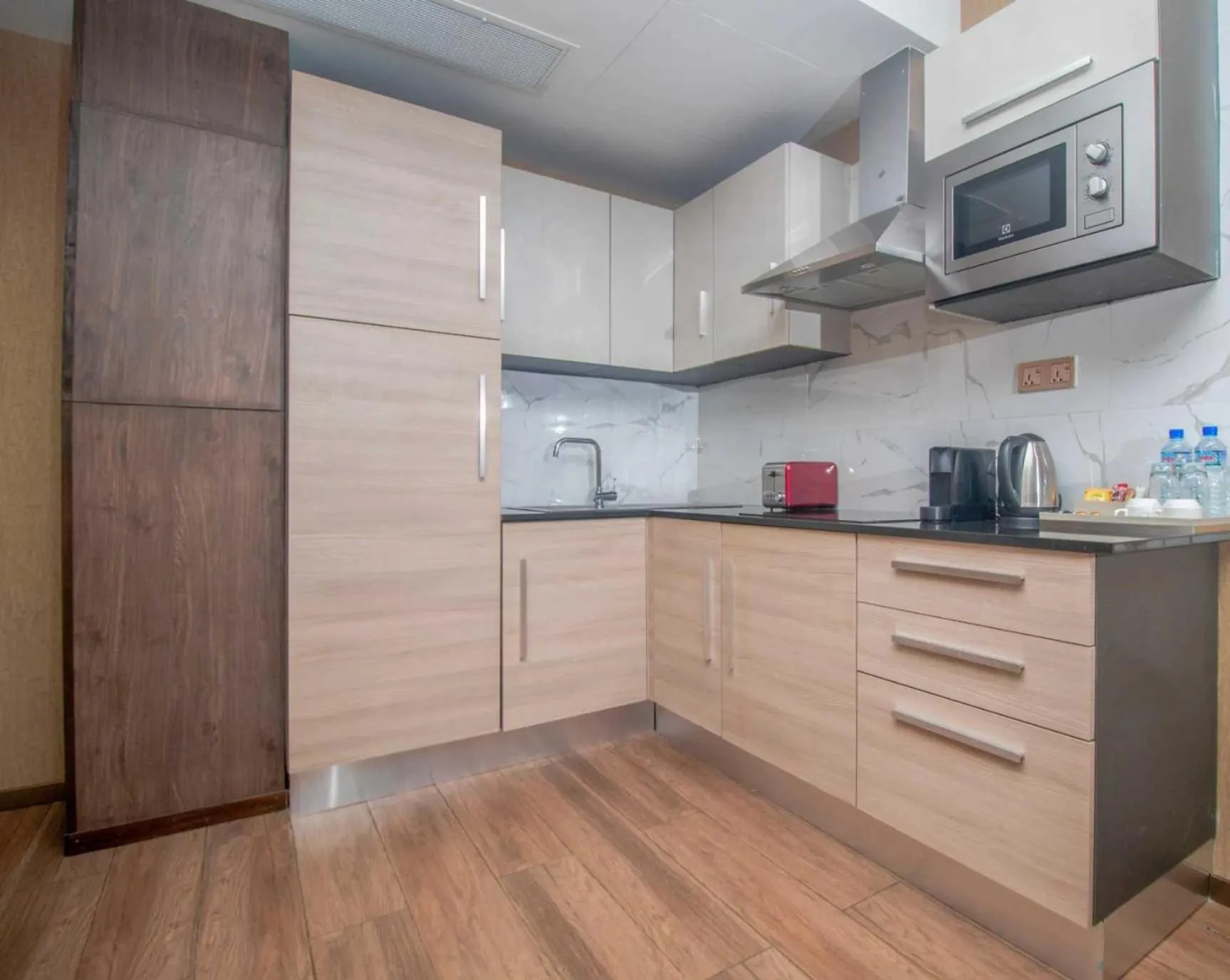 Kitchen or kitchenette in CIKA GOLDEN HOTEL and SUITES