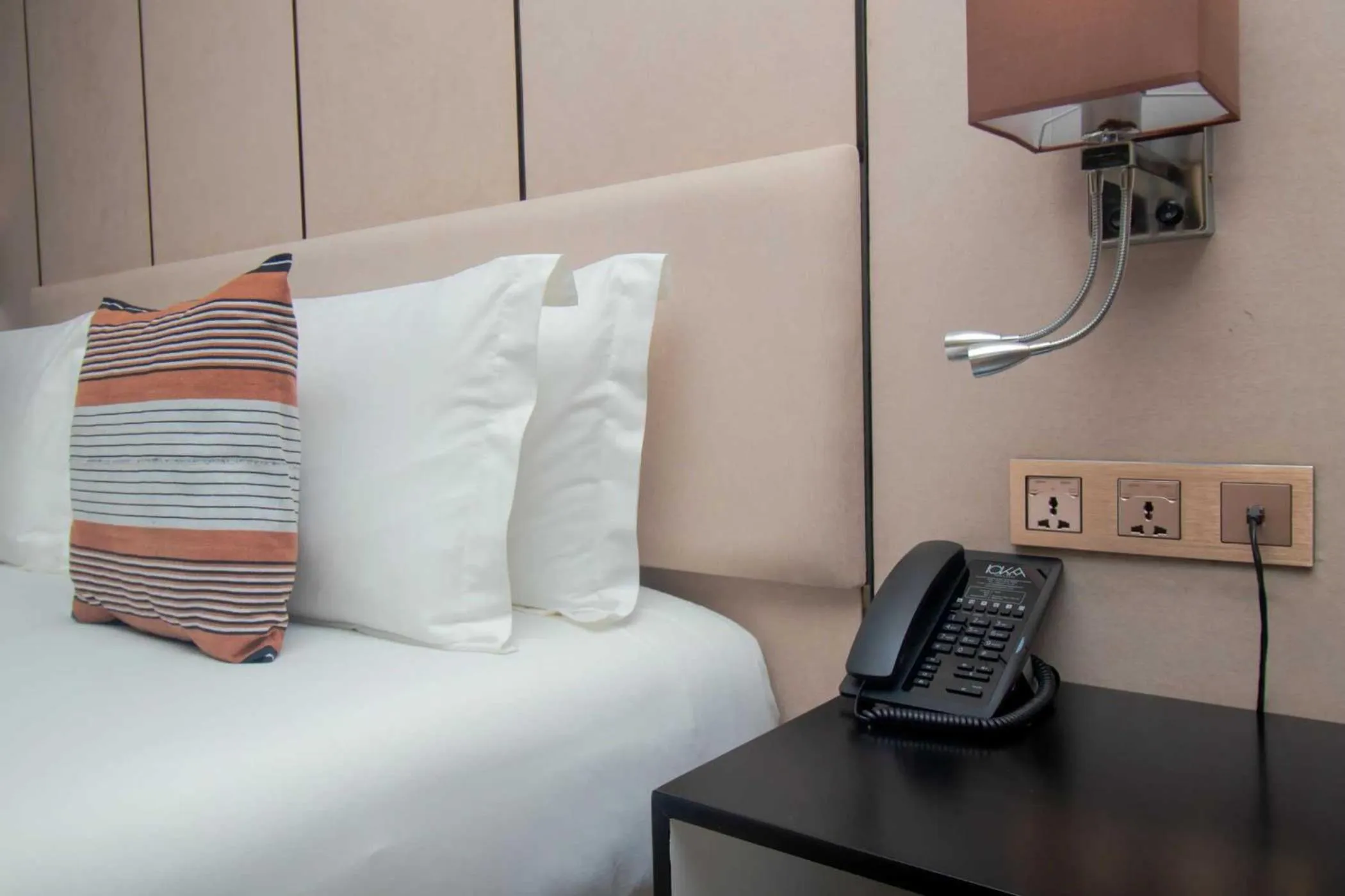 Bed in CIKA GOLDEN HOTEL and SUITES