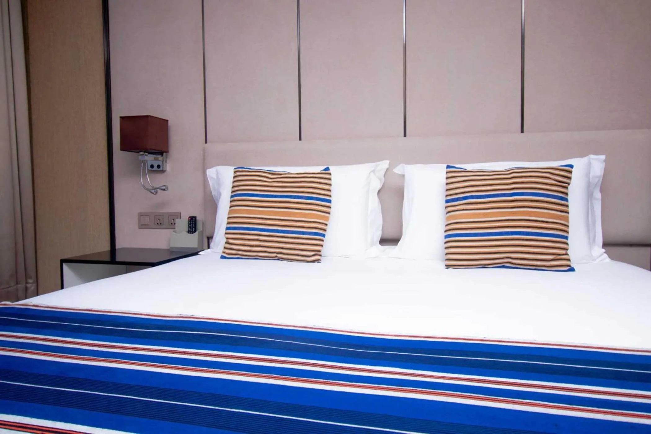 Bed in CIKA GOLDEN HOTEL and SUITES