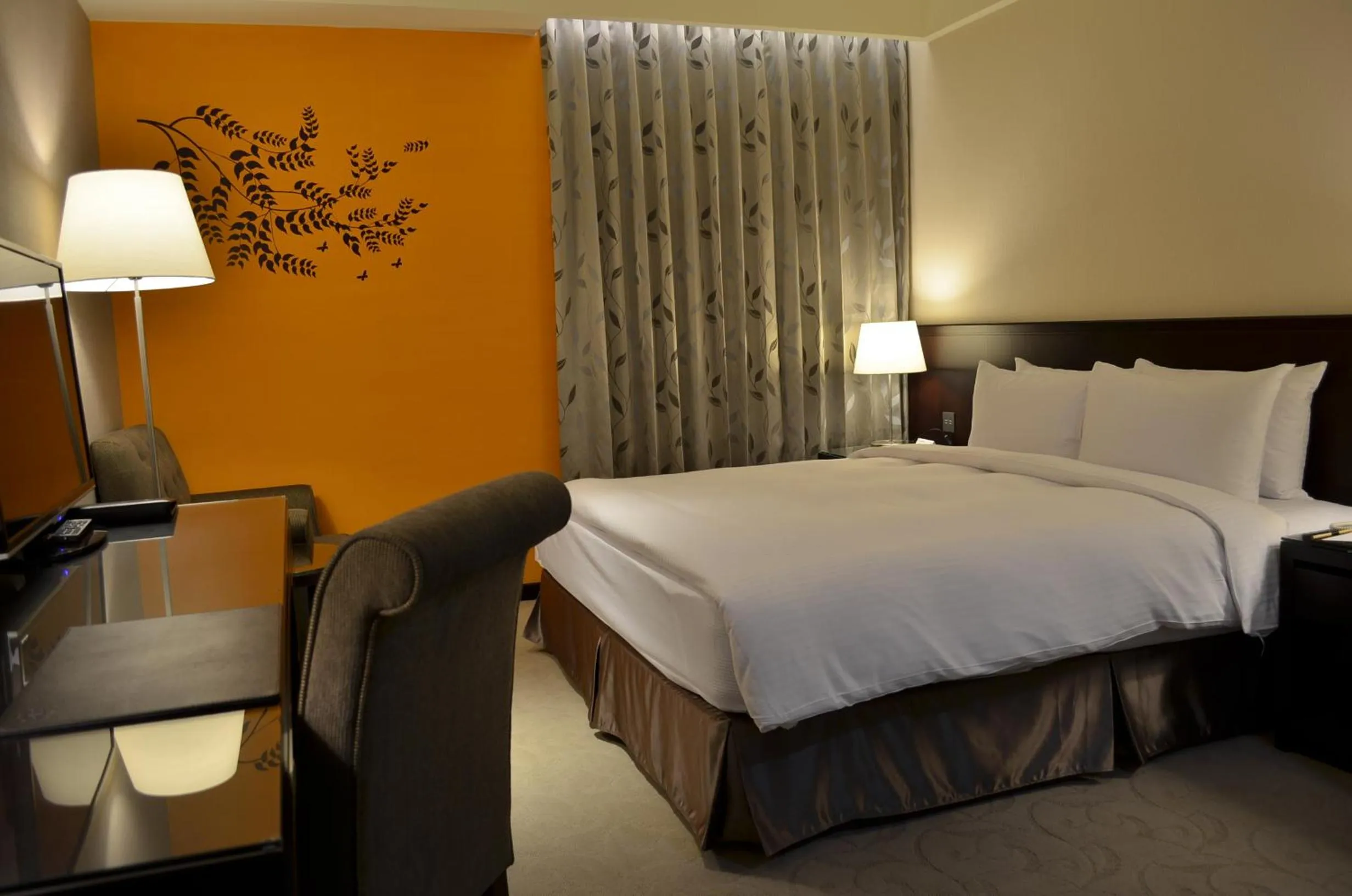 Bed in 雀客旅館台中來來