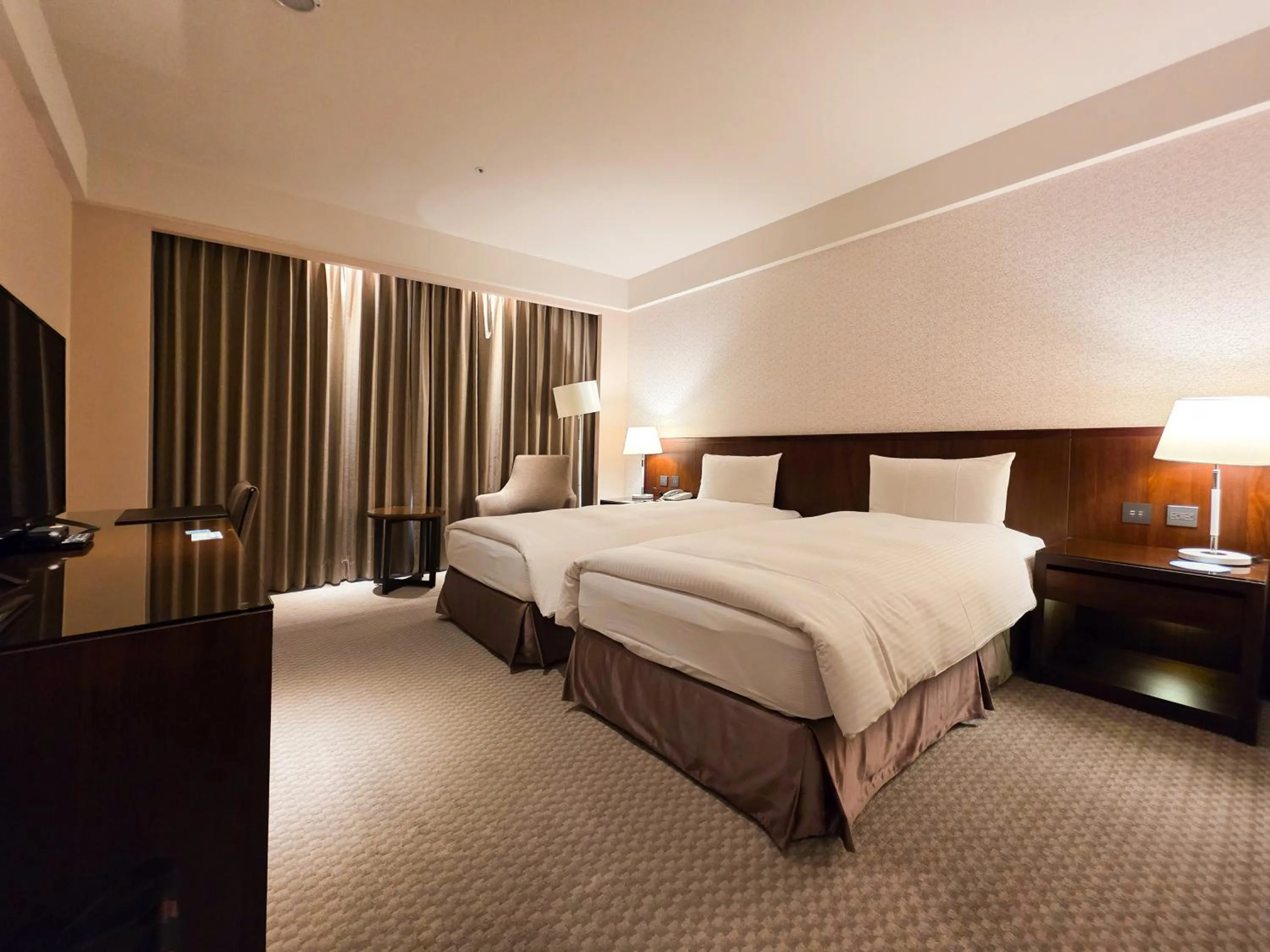 Bed in 雀客旅館台中來來