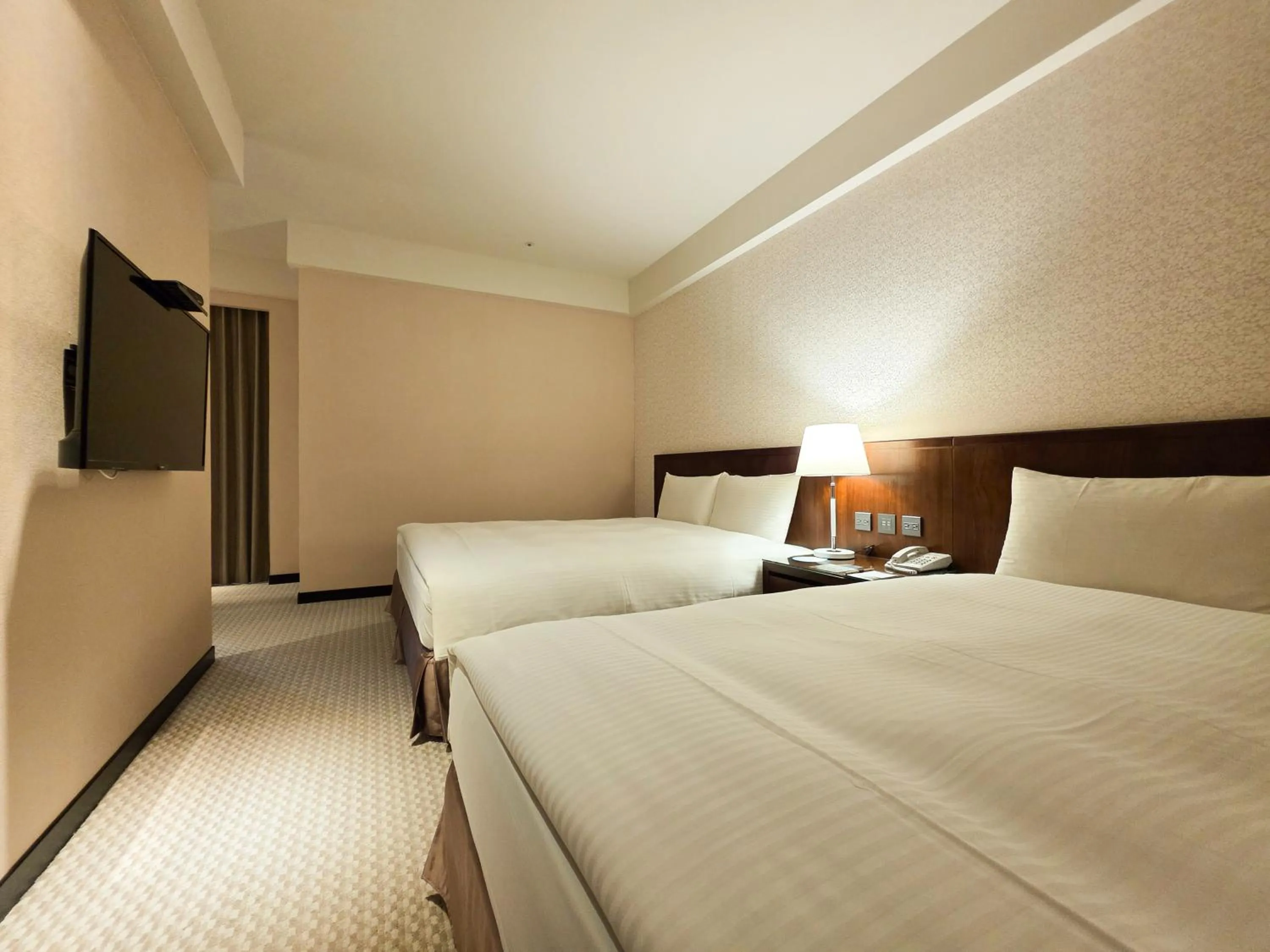 Bed in 雀客旅館台中來來